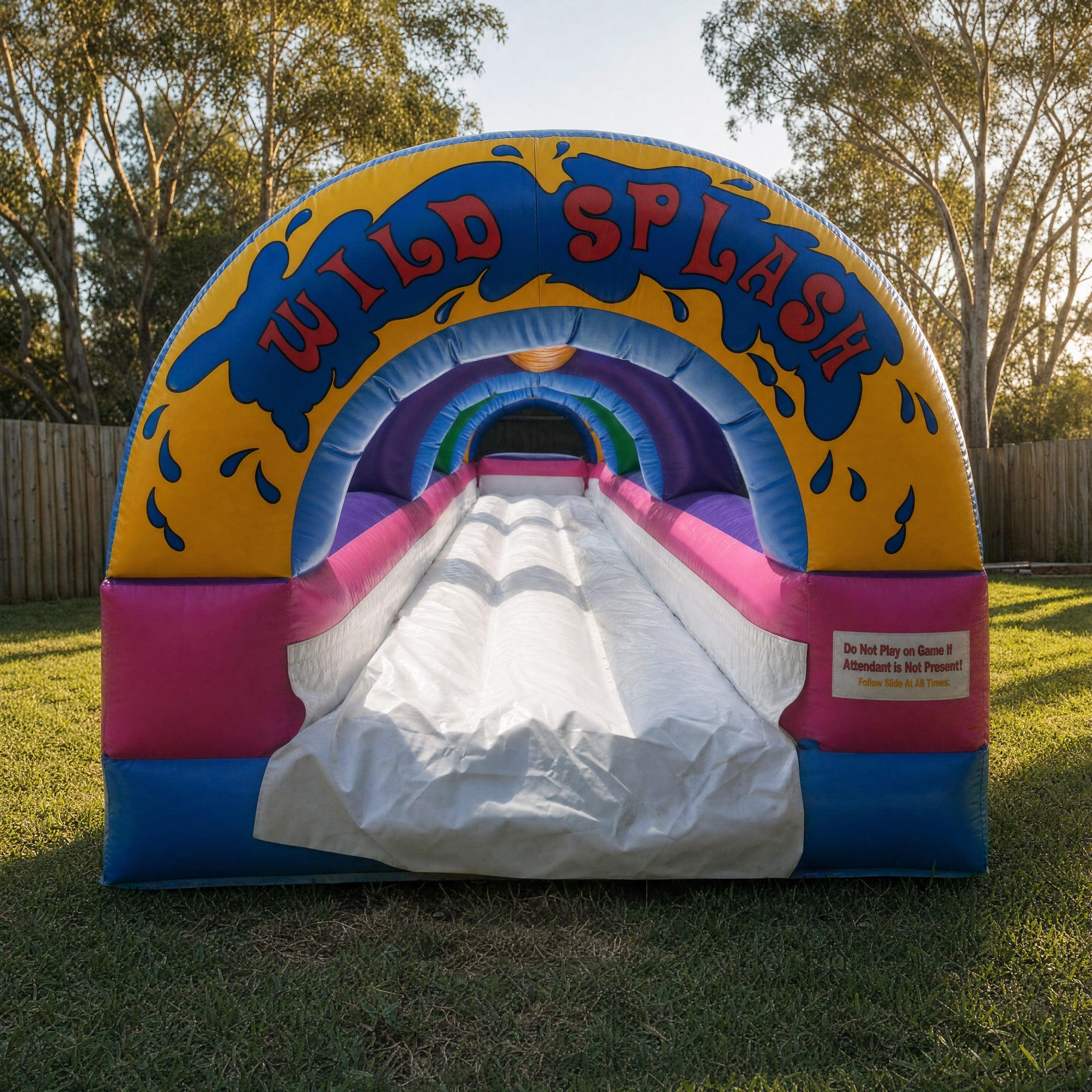 Front view of the Wild Splash entrance arch on the 1 Lane Wild Splash Slip N Slide