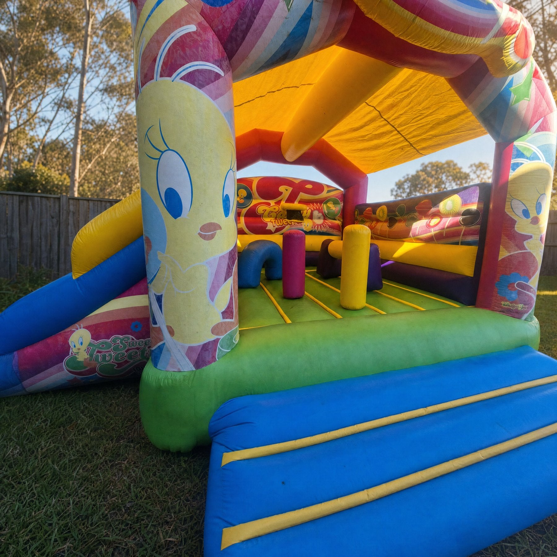 Candy Tweety Bird Castle with Slide Combo Hire - close entrance and obstacle interior detail