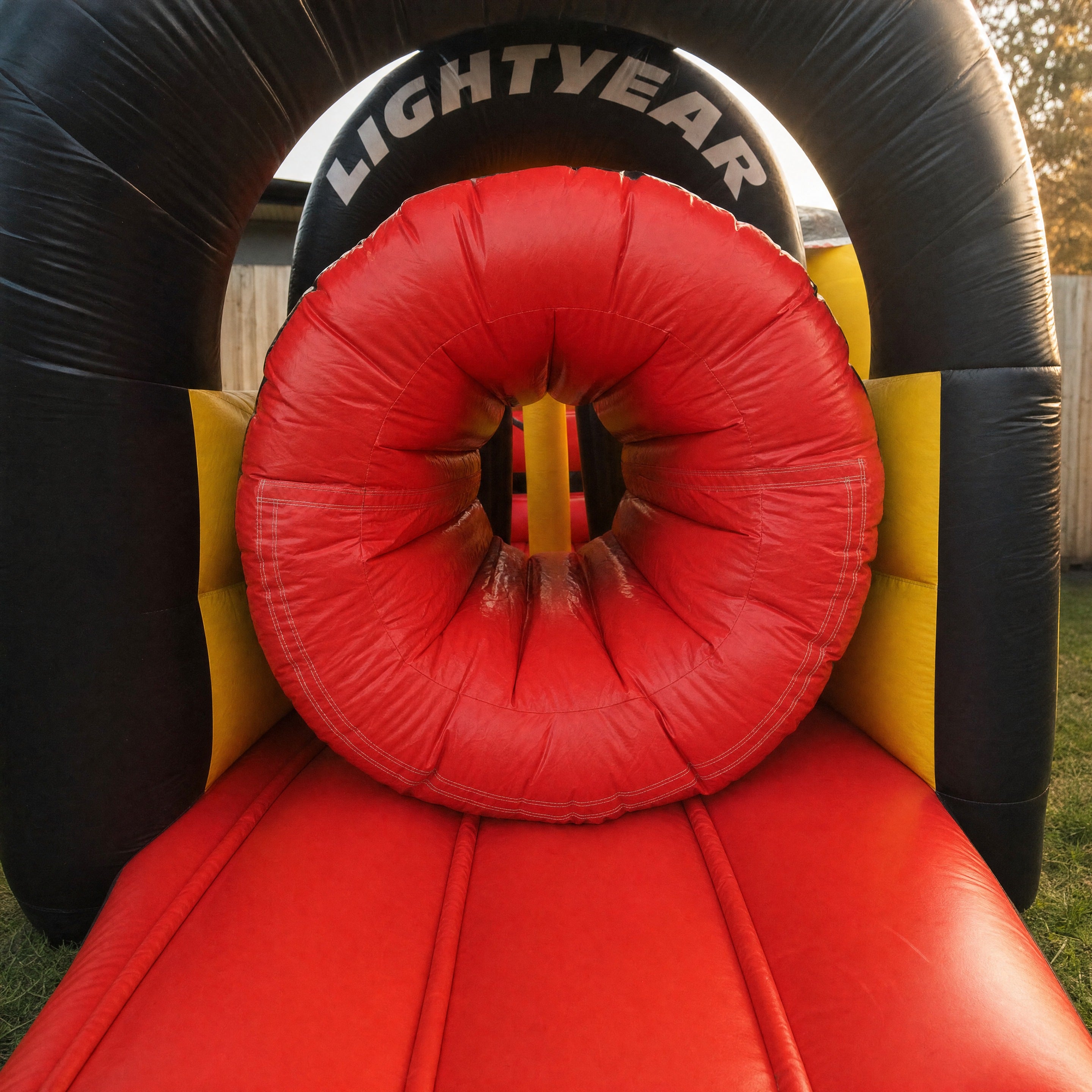 Tyre tunnel entrance of the Cars Obstacle Challenge with LIGHTYEAR arch