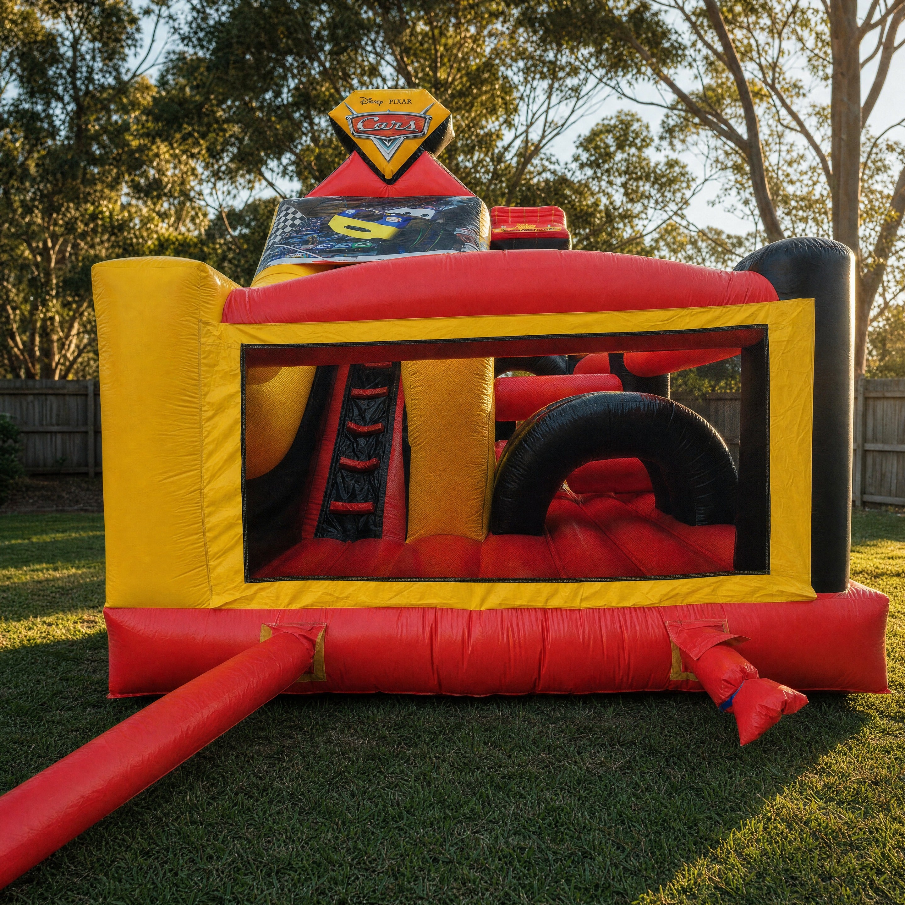 Front view of the Cars Obstacle Challenge with mesh windows and Cars logo topper