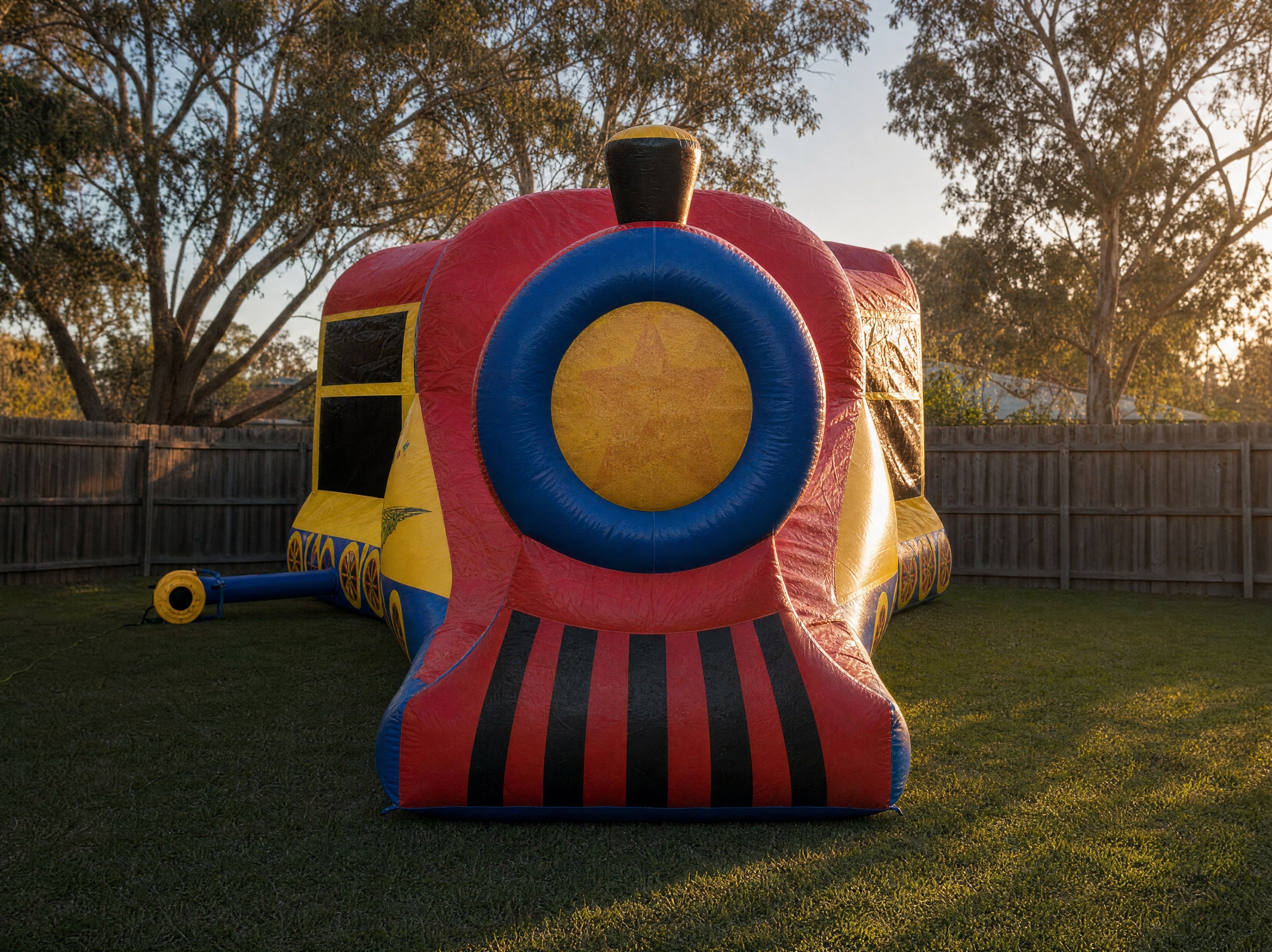 Choo Choo 3in1 Combo jumping castle, wide front view showing the full entrance