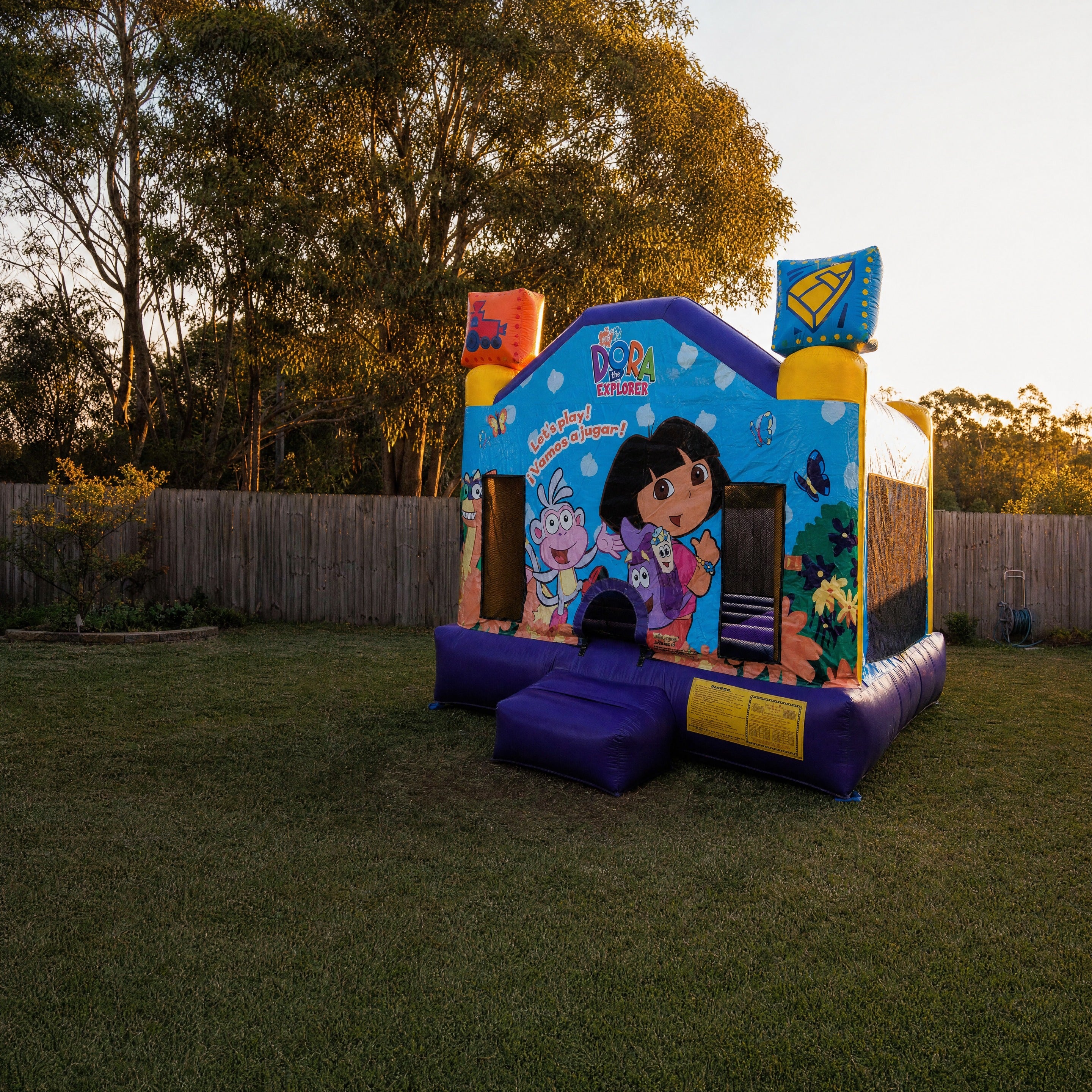 Dora Jumping Castle pulled back to show full Central Coast backyard scale