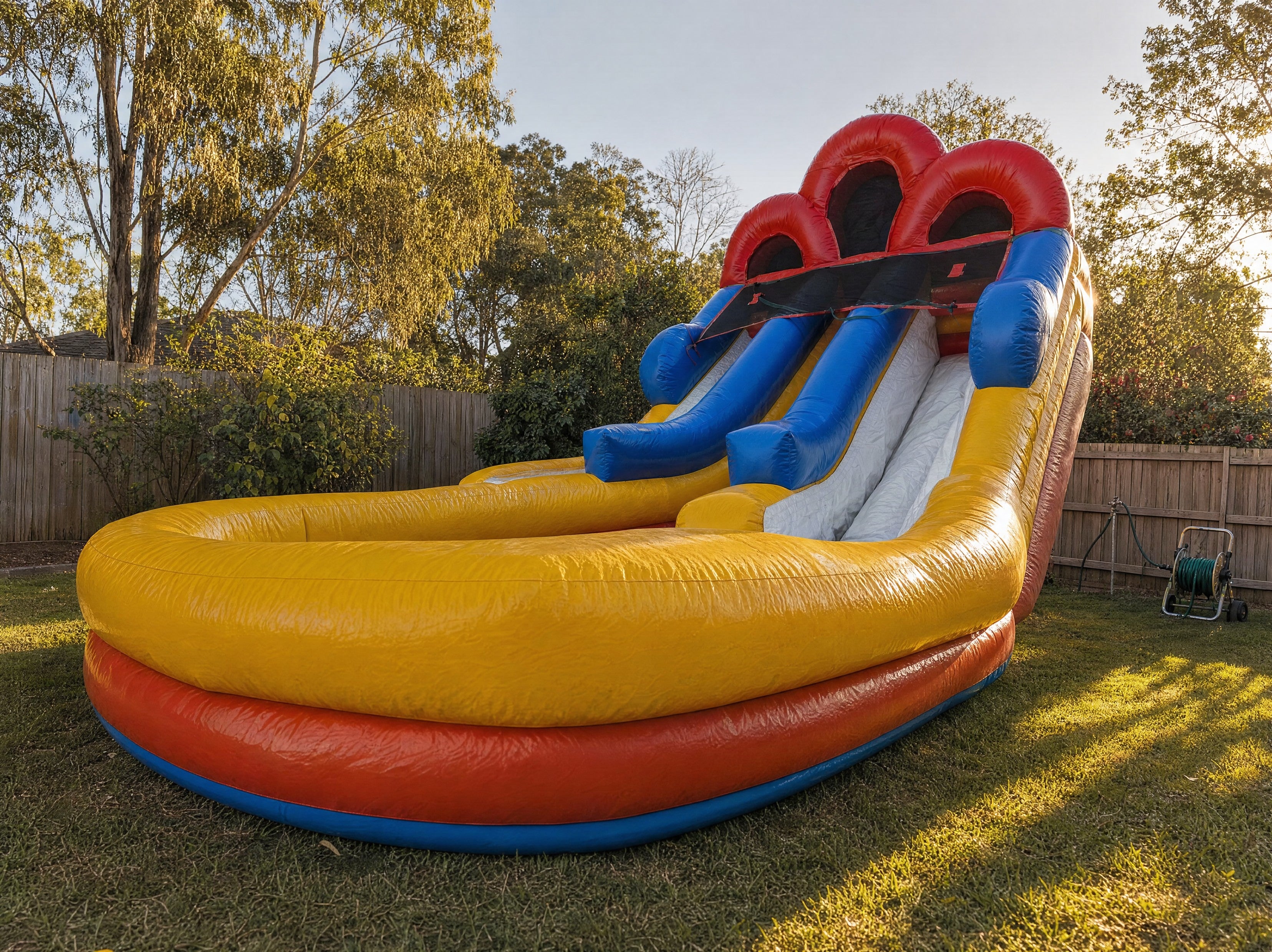 Double Lane Water Slide Hire - wide landing pool view showing scale
