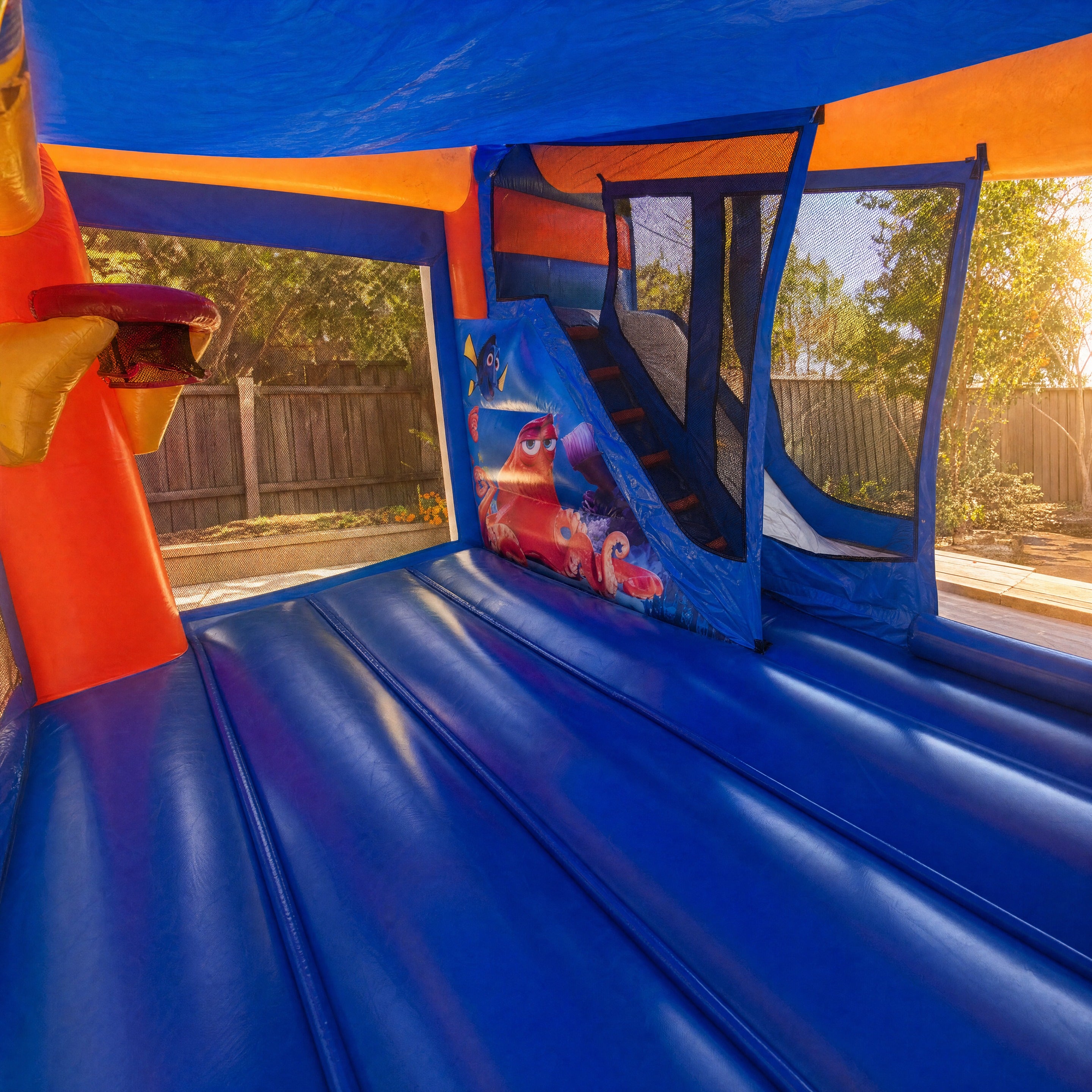 Finding Dory C4 Combo Hire - through the doorway peek showing basketball hoop and climbing wall