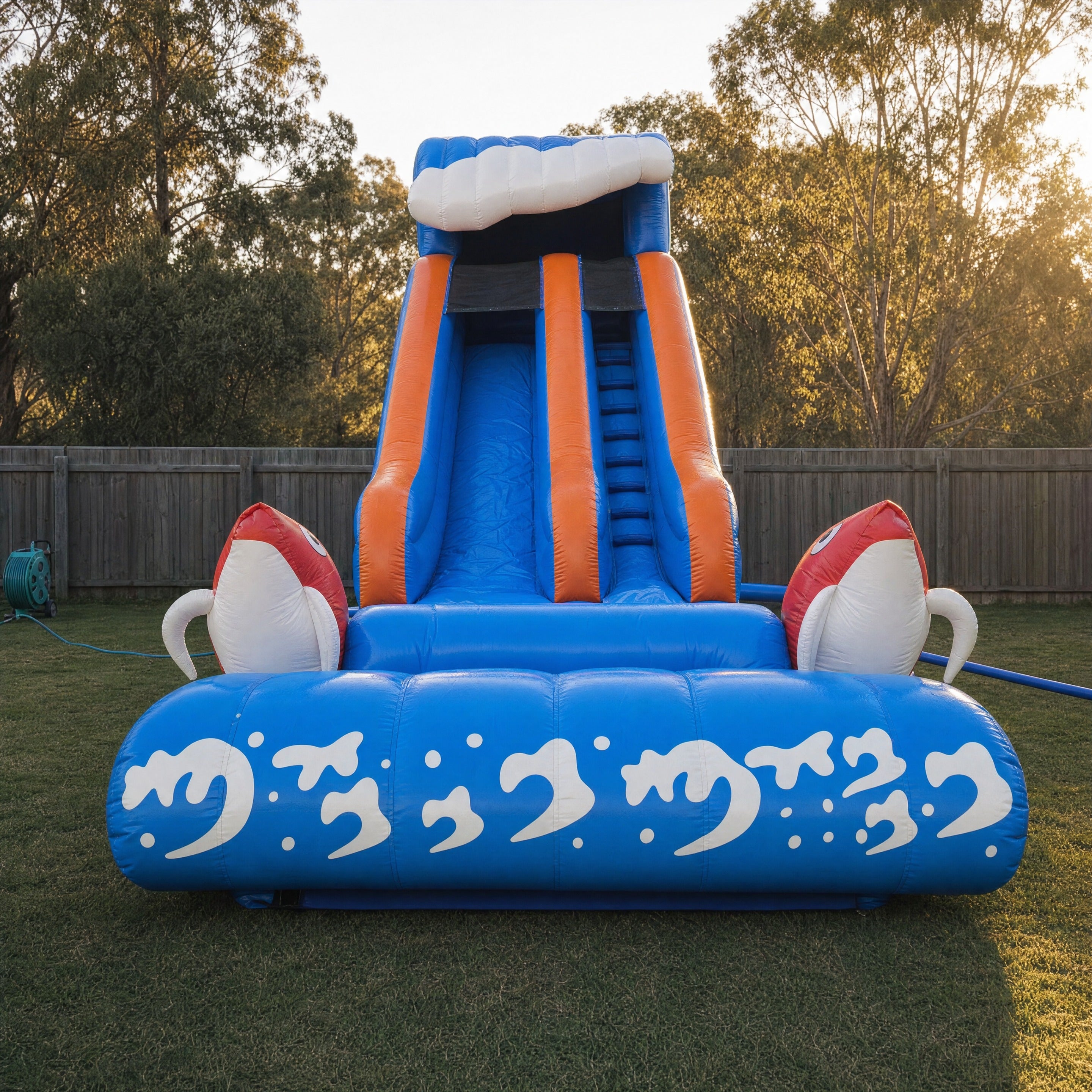 Fish World Water Slide Hire, Central Coast - straight-on front view looking up the three slide lanes