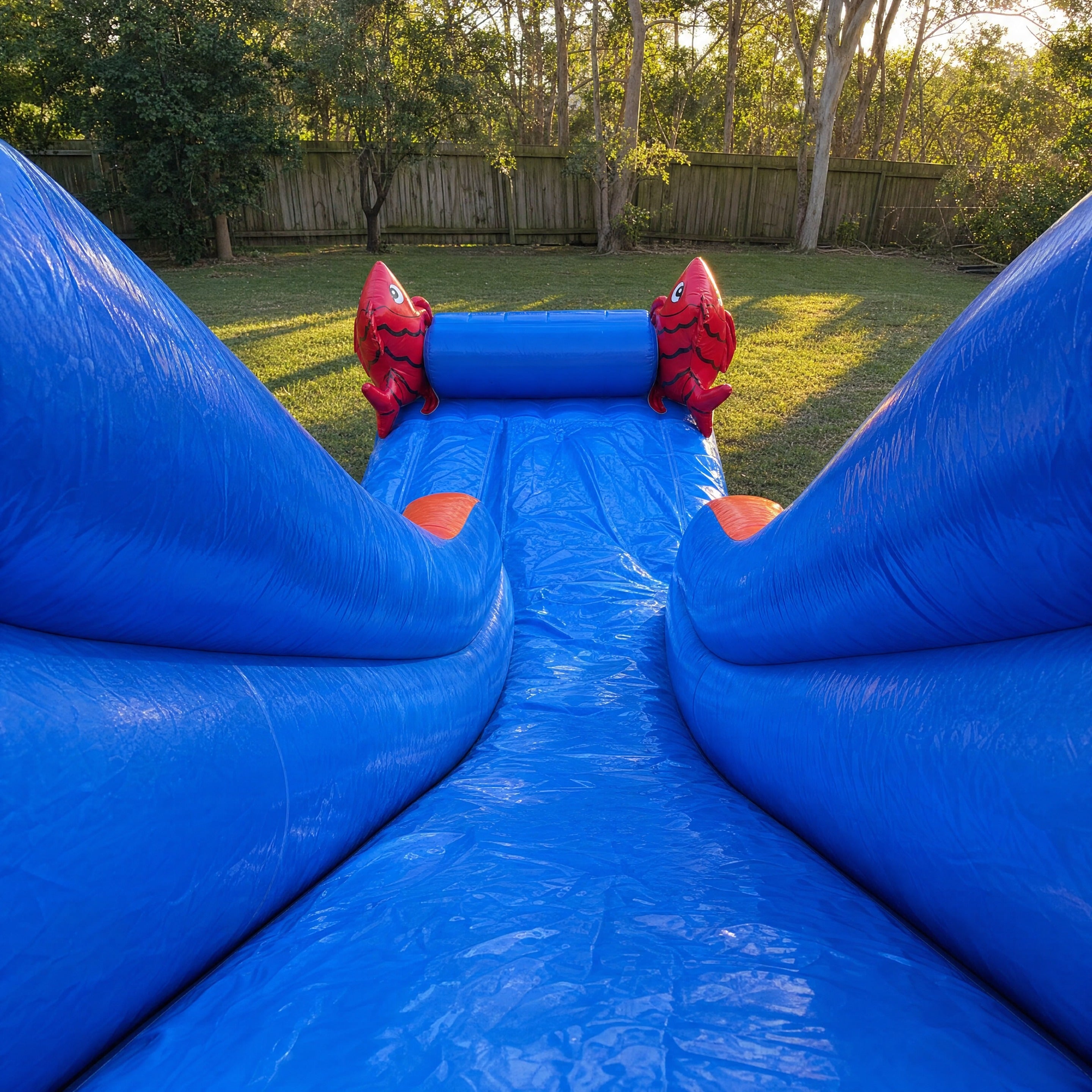Fish World Water Slide Hire, Central Coast - point of view looking down the lanes to the landing pool
