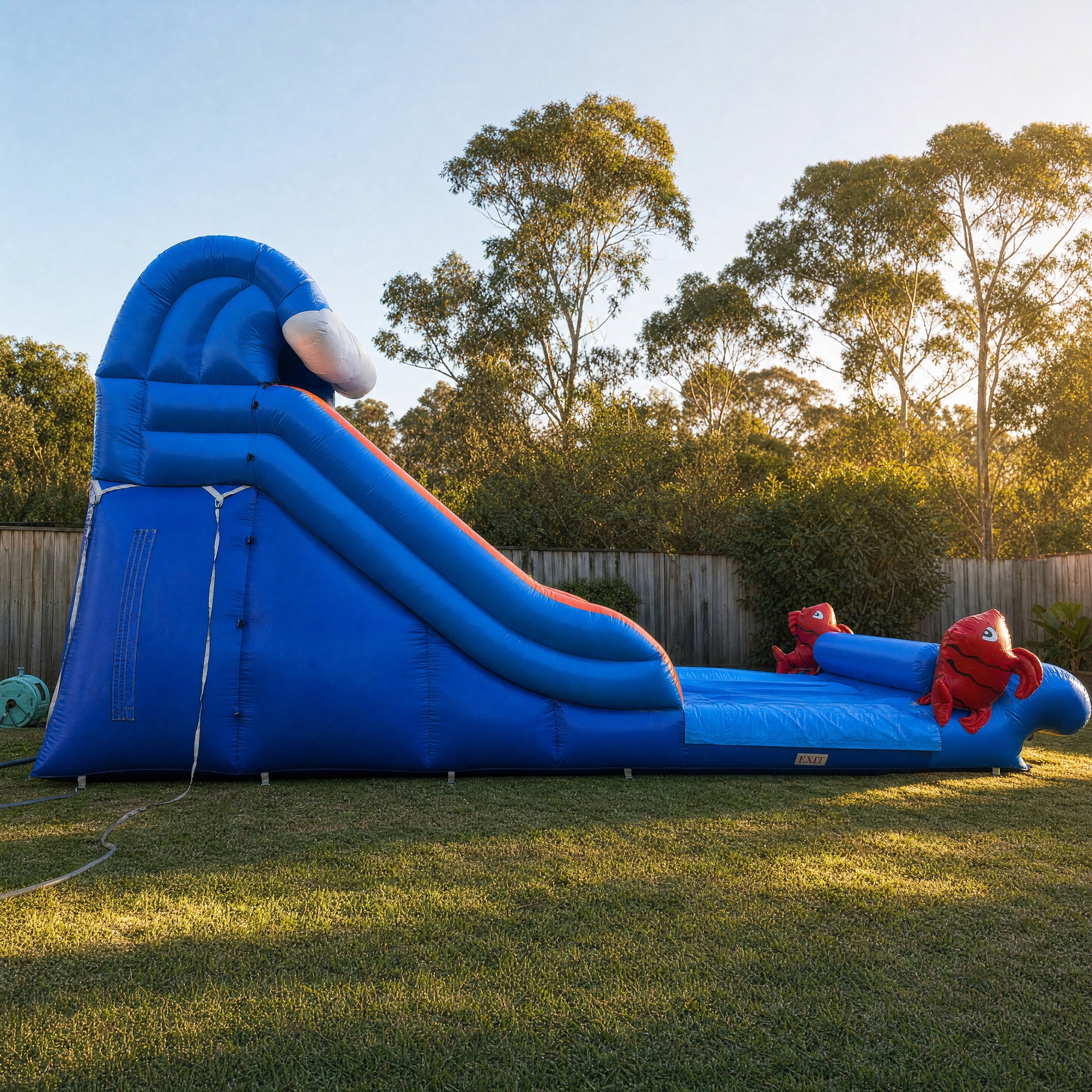 Fish World Water Slide Hire, Central Coast - full side profile showing the whole unit