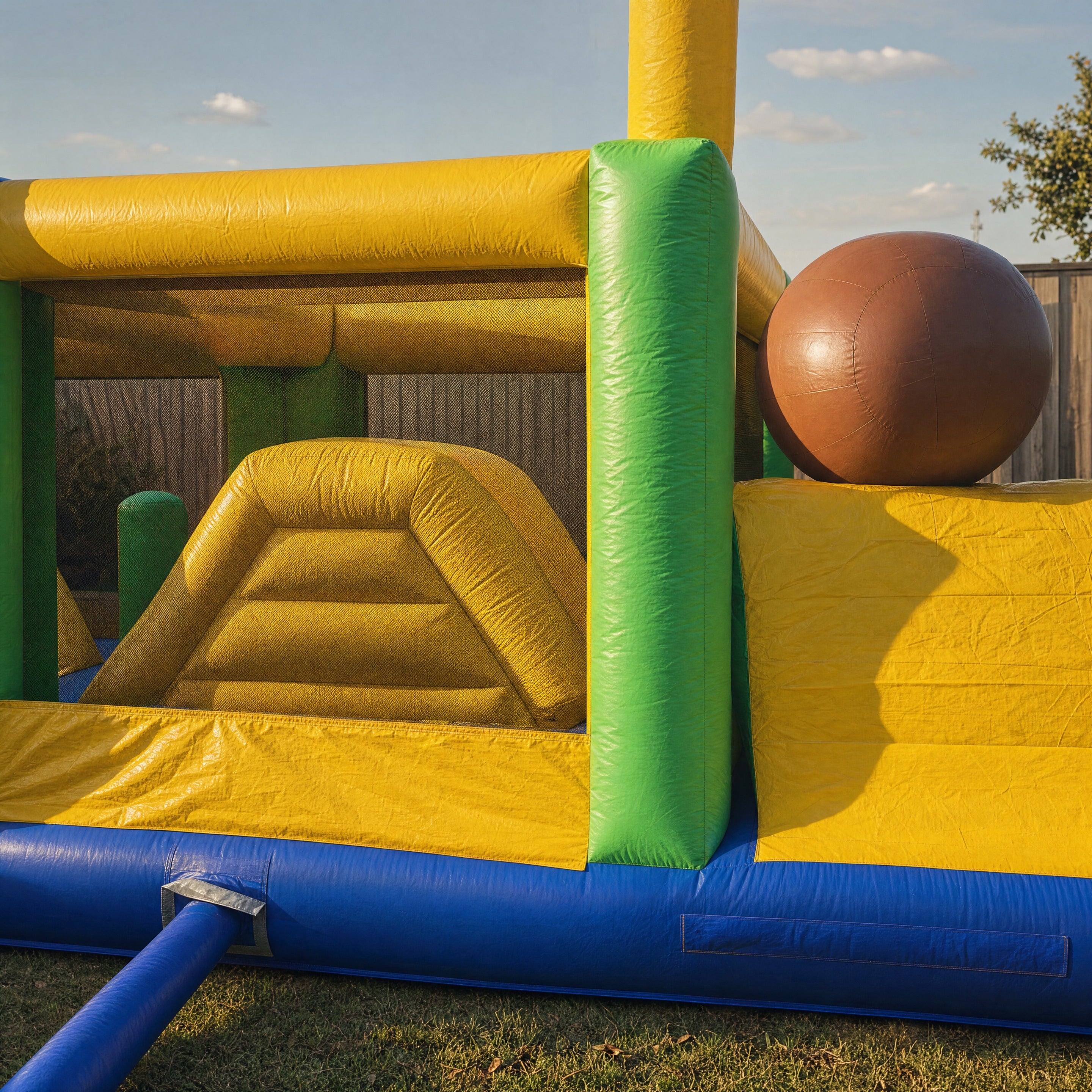 Football shaped inflatable ball feature on the Footy Obstacle Challenge obstacle course