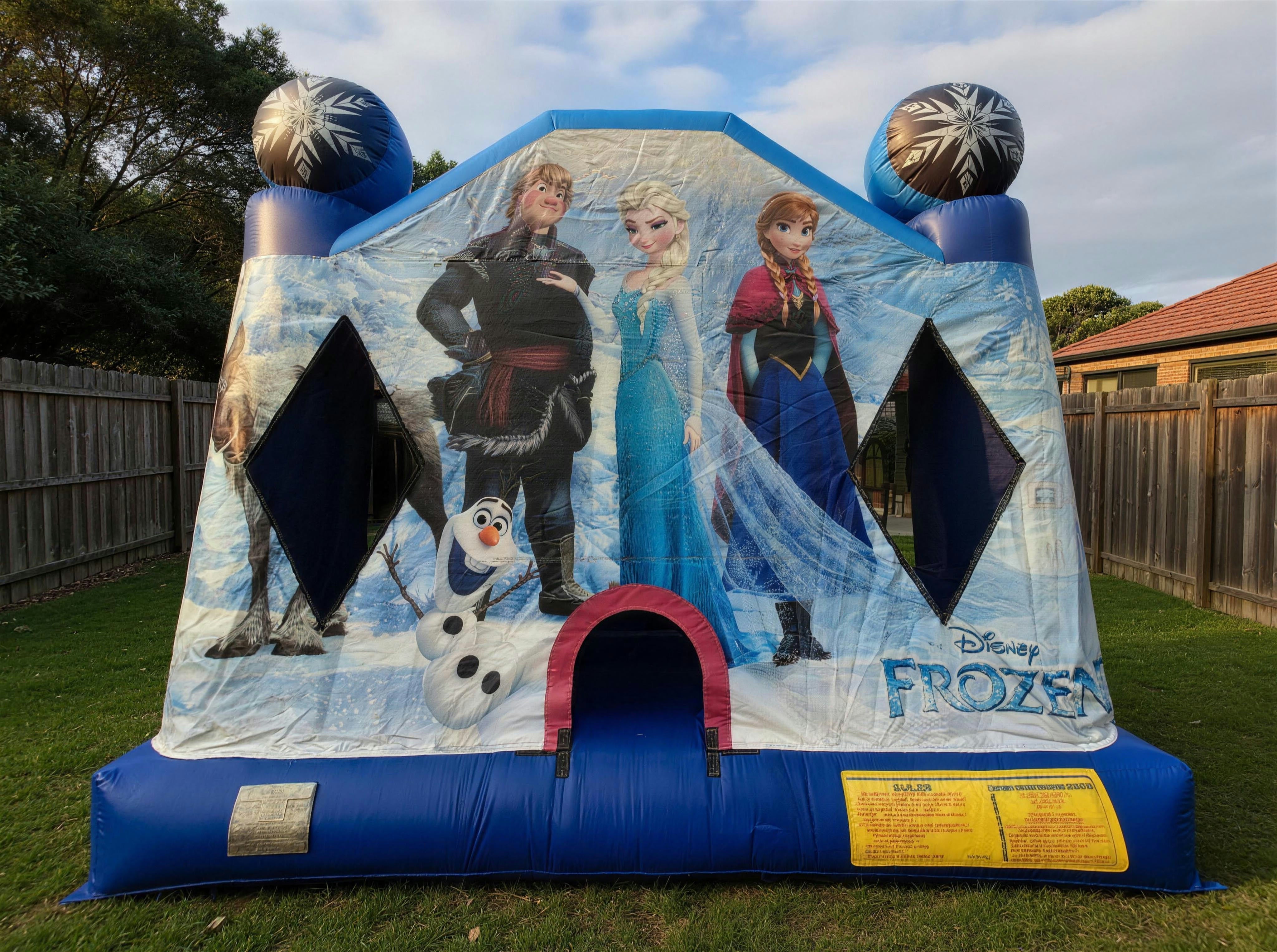 Wide front view of the Frozen Jumping Castle showing the character panel with yard context