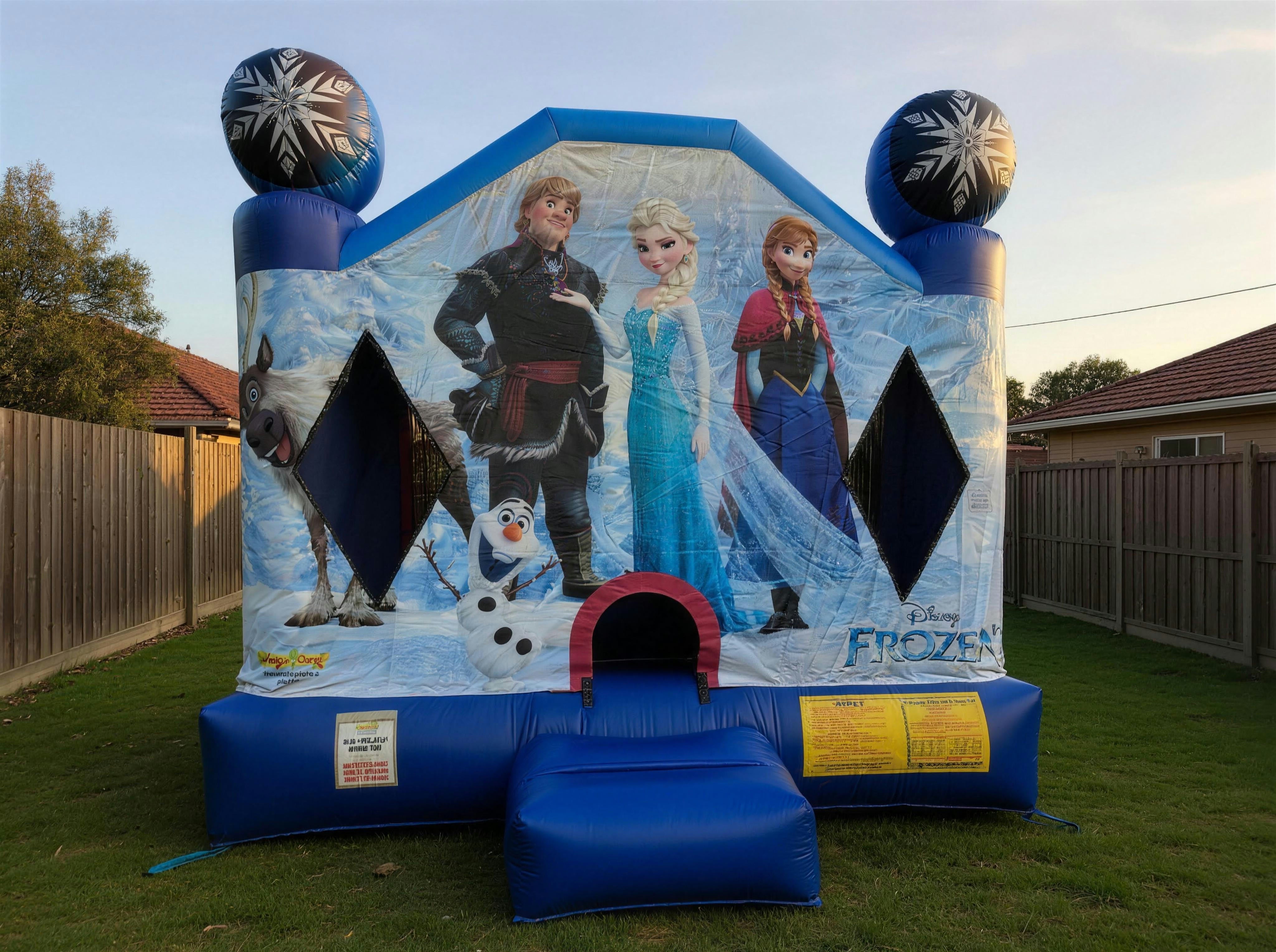 Wide view of the Frozen Jumping Castle in a real Central Coast backyard
