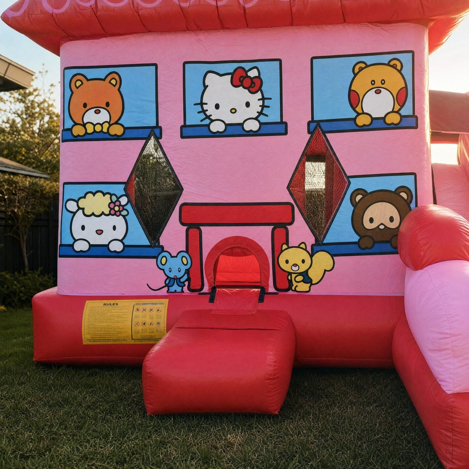 Entrance archway and safety placard detail on the Hello Kitty C7 Combo jumping castle