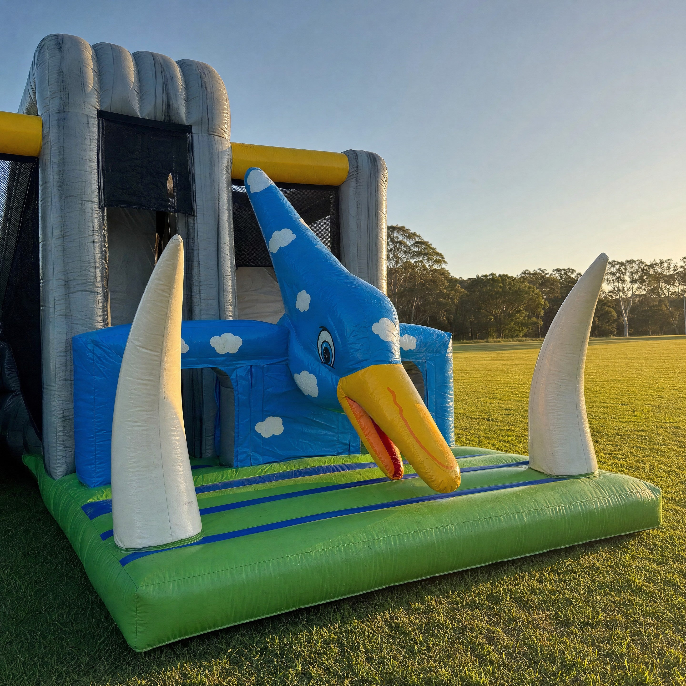 Blue and yellow pterodactyl head feature on the Jurassic Adventure Obstacle