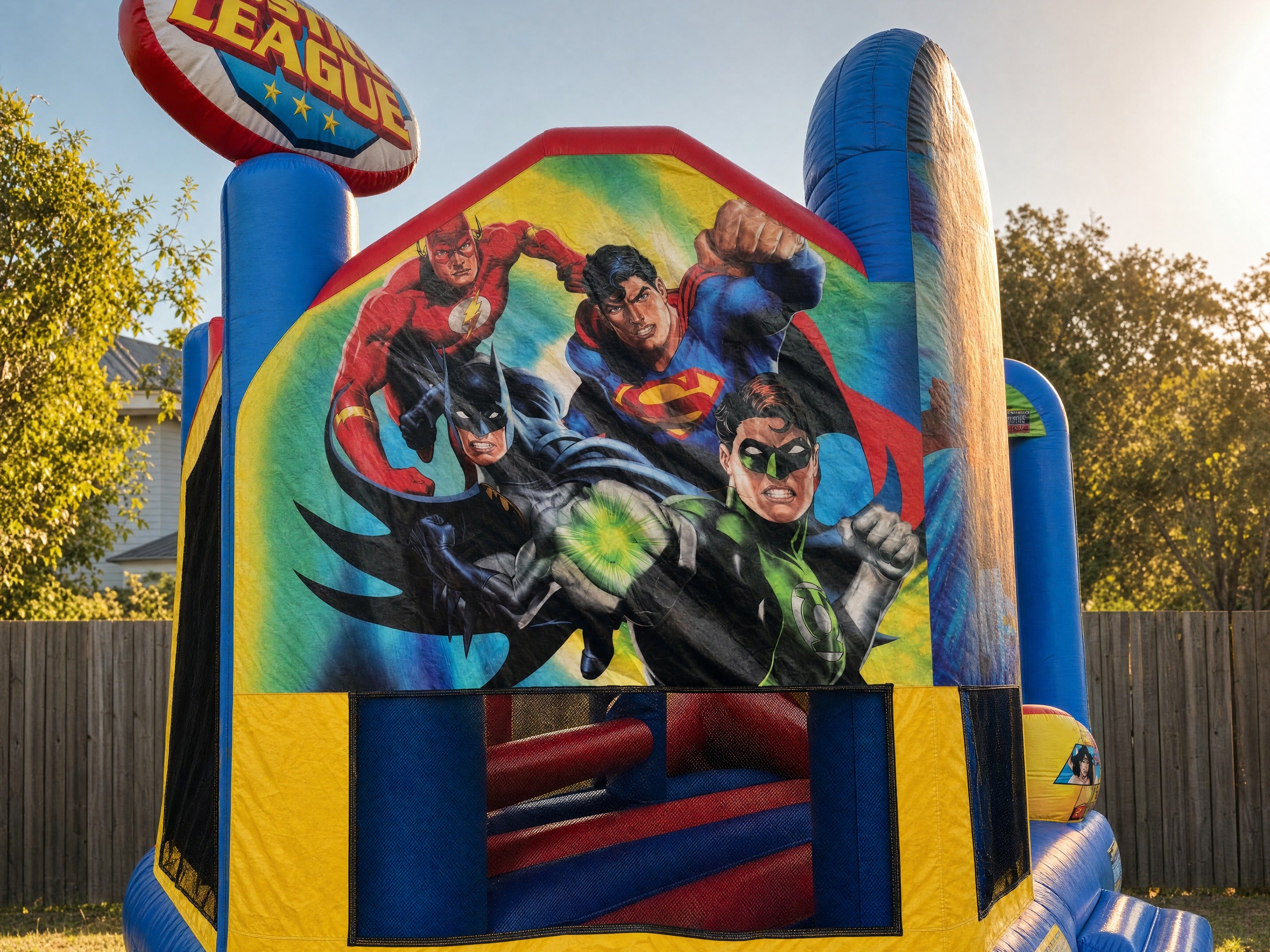 Justice League 5in1 Combo hire castle front face wide view, Central Coast jumping castle hire