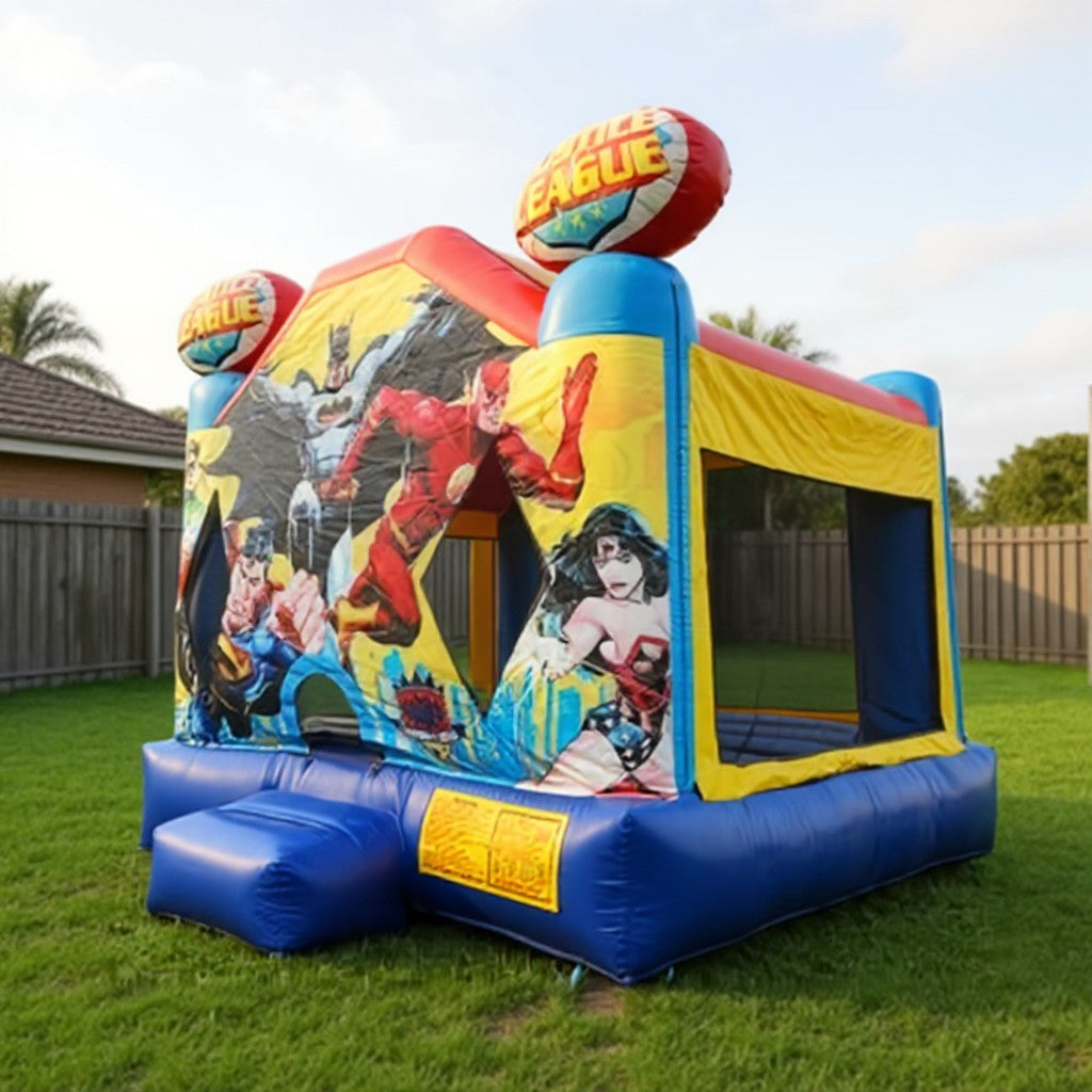 Justice League jumping castle pulled back to show the full backyard setting