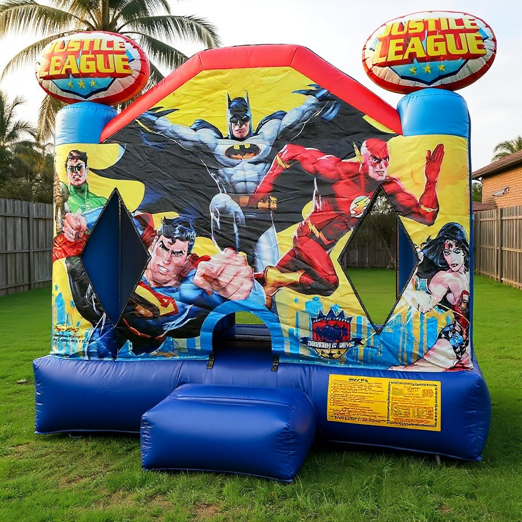 Entrance view of the Justice League jumping castle with landing mat and toppers