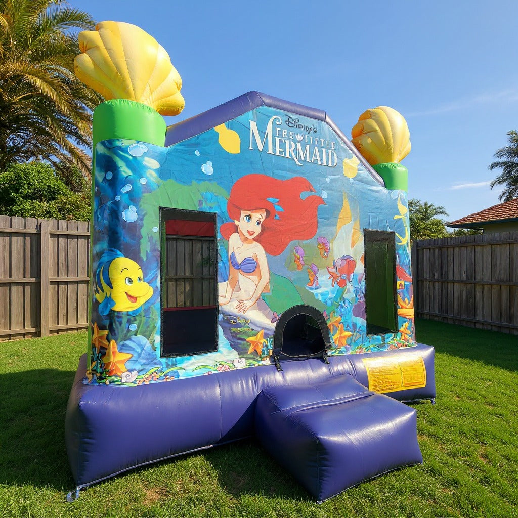 Little Mermaid Jumping Castle - low angle view looking up at the shell toppers