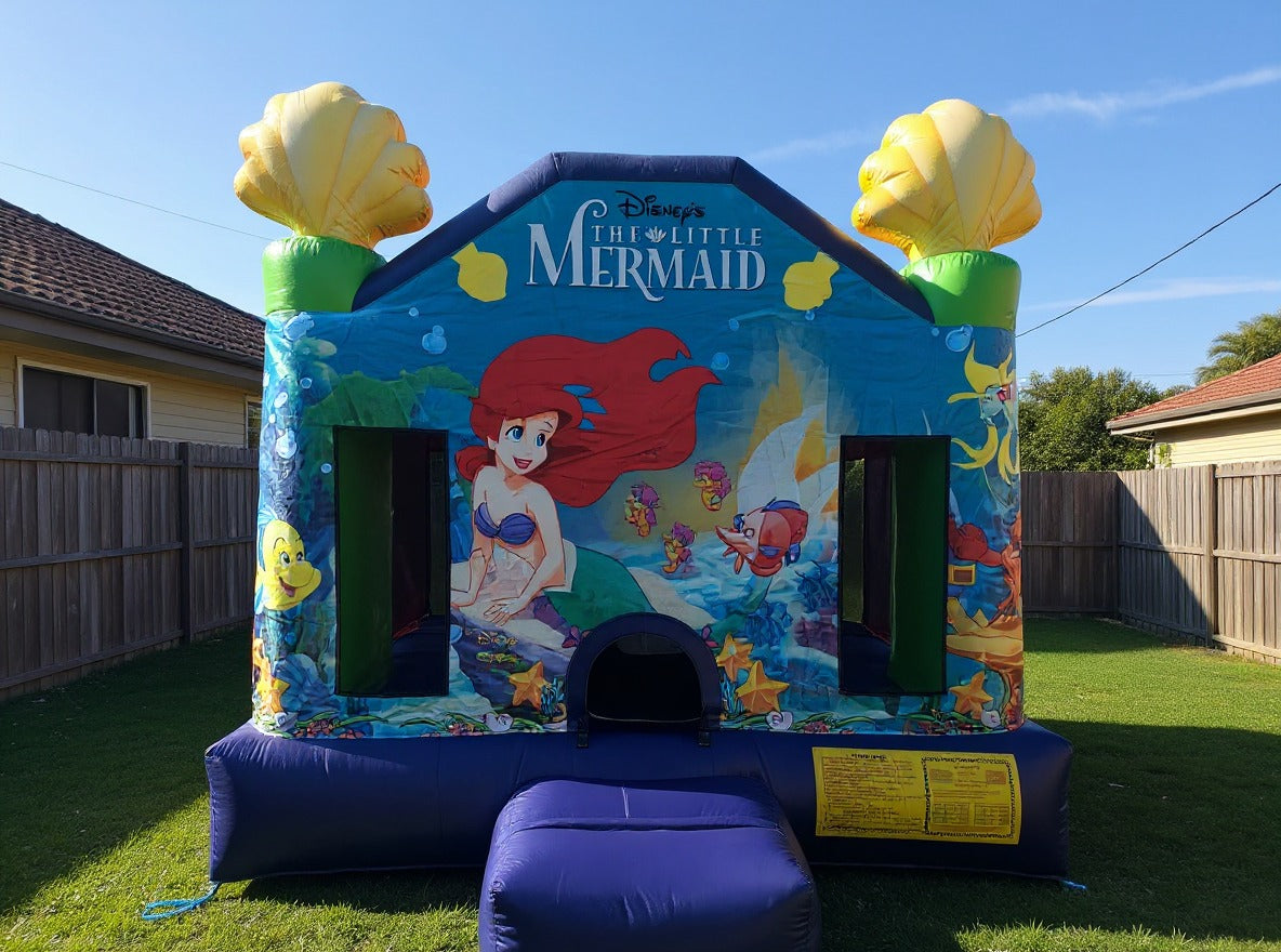 Little Mermaid Jumping Castle - wide desktop hero view at golden hour