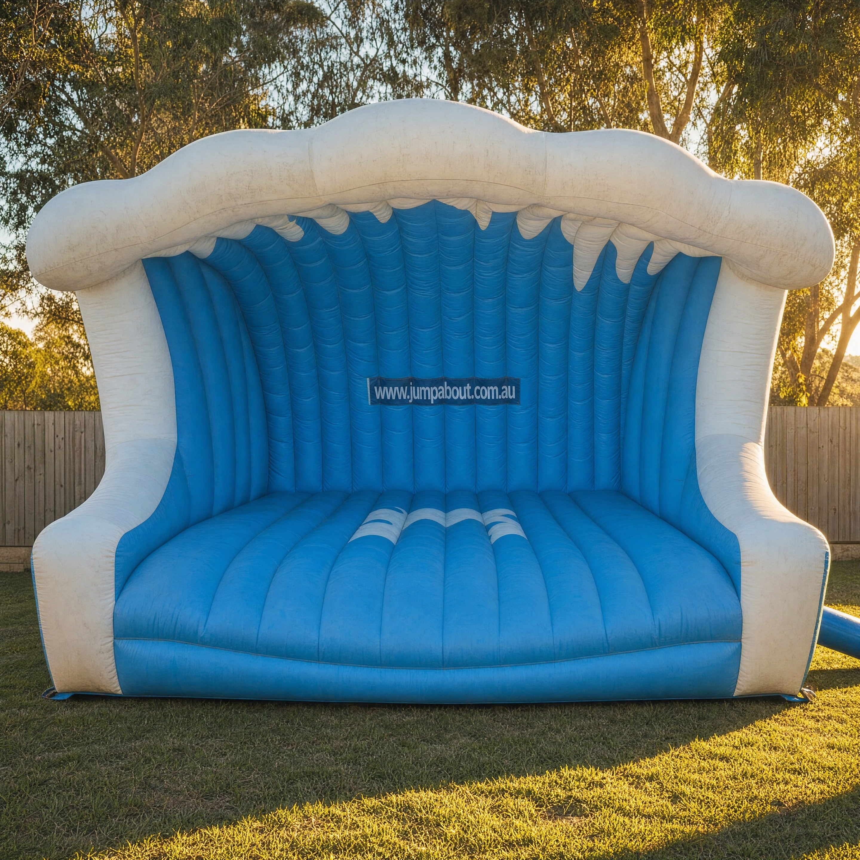 Mechanical Surfboard hire, straight-on front view of the wave-shaped inflatable ride