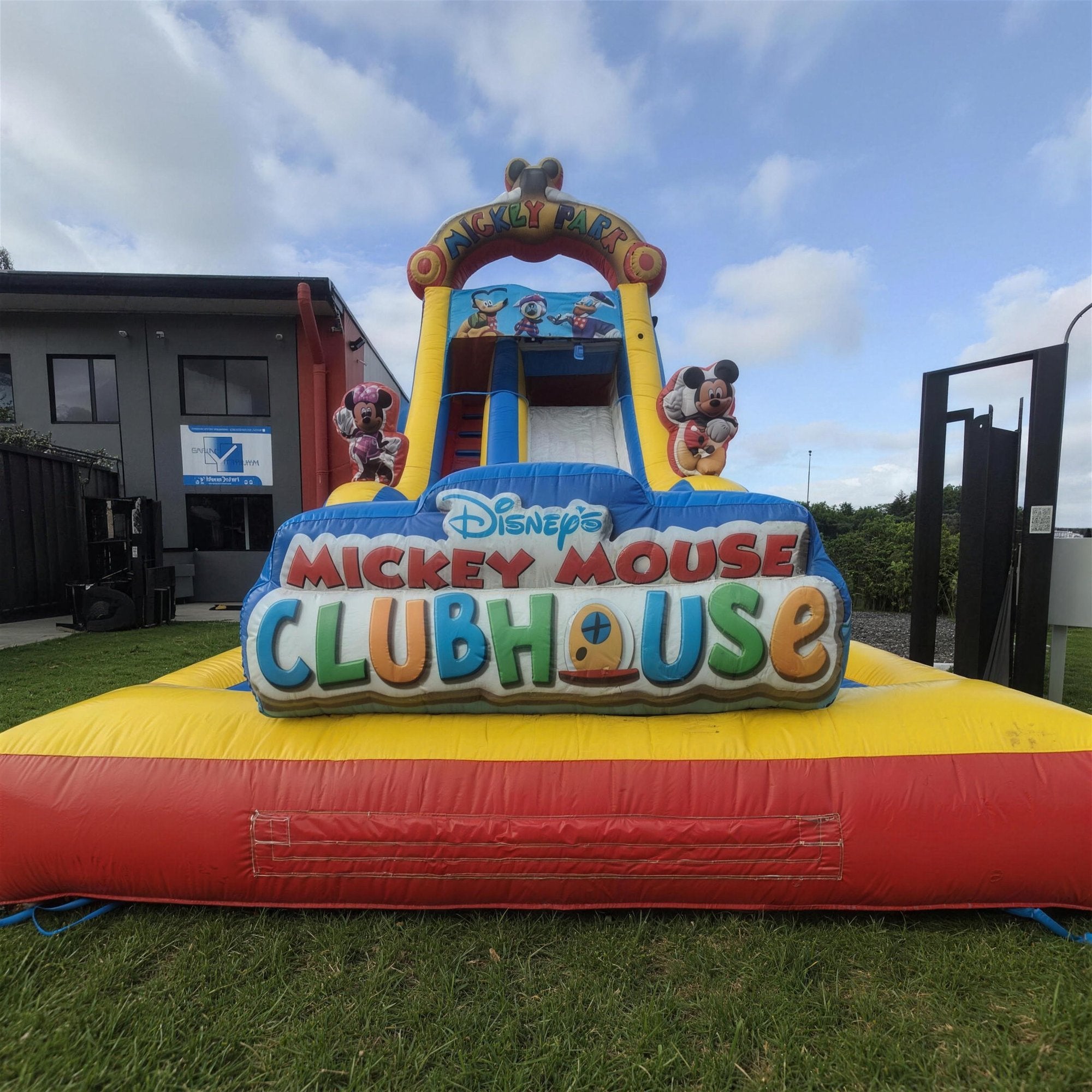 Mickey Mouse Water Slide with Pool Hire, side profile view, Jump About