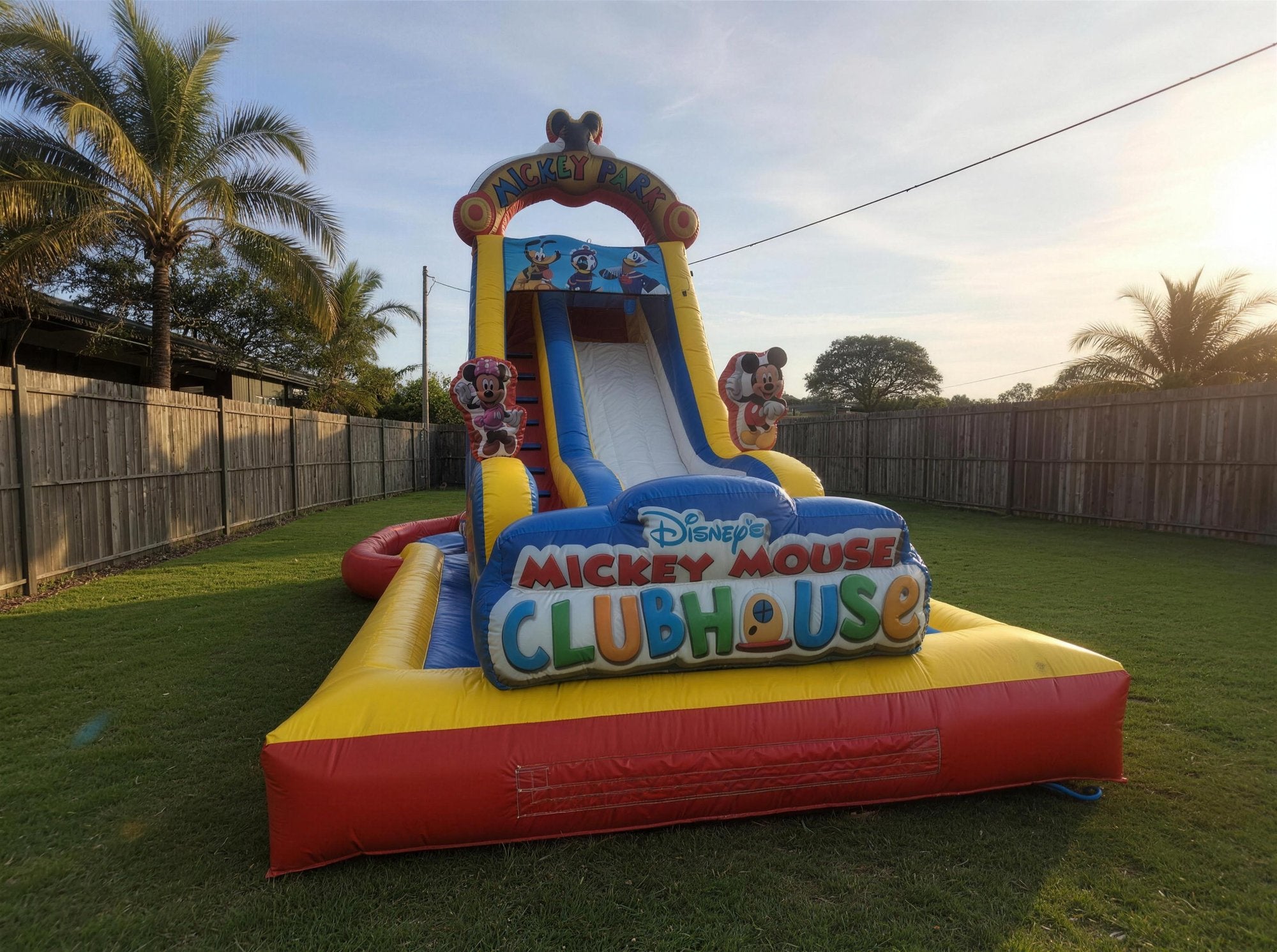 Mickey Mouse Water Slide with Pool Hire, wide front three quarter view, Jump About Central Coast