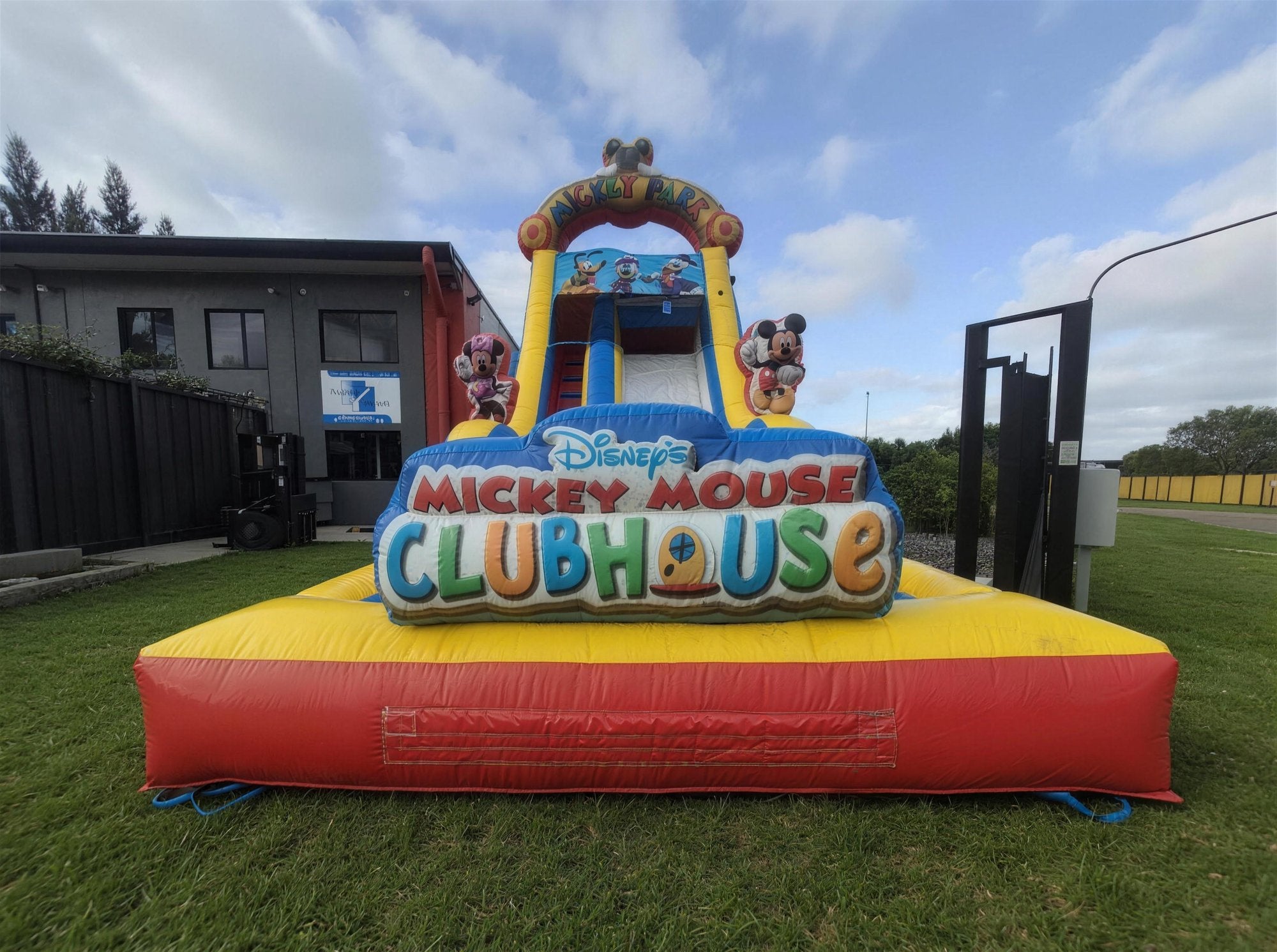 Mickey Mouse Water Slide with Pool Hire, low angle dramatic view, Jump About