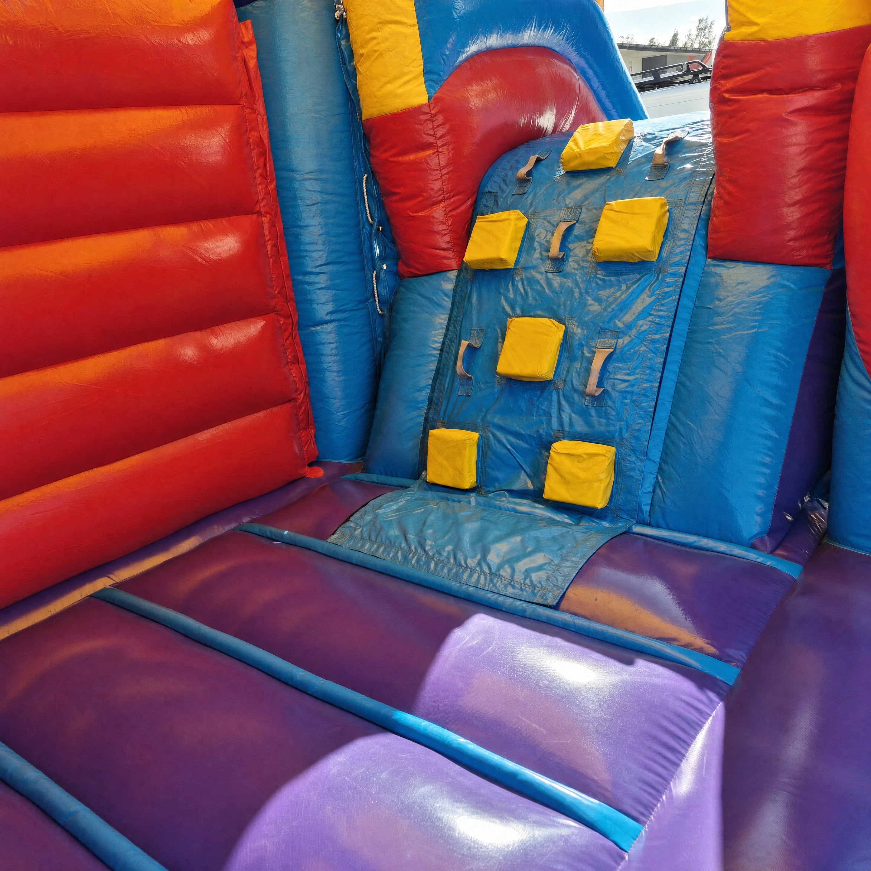 Interior climbing wall and basketball hoop panel inside the module side slide banner castle combo