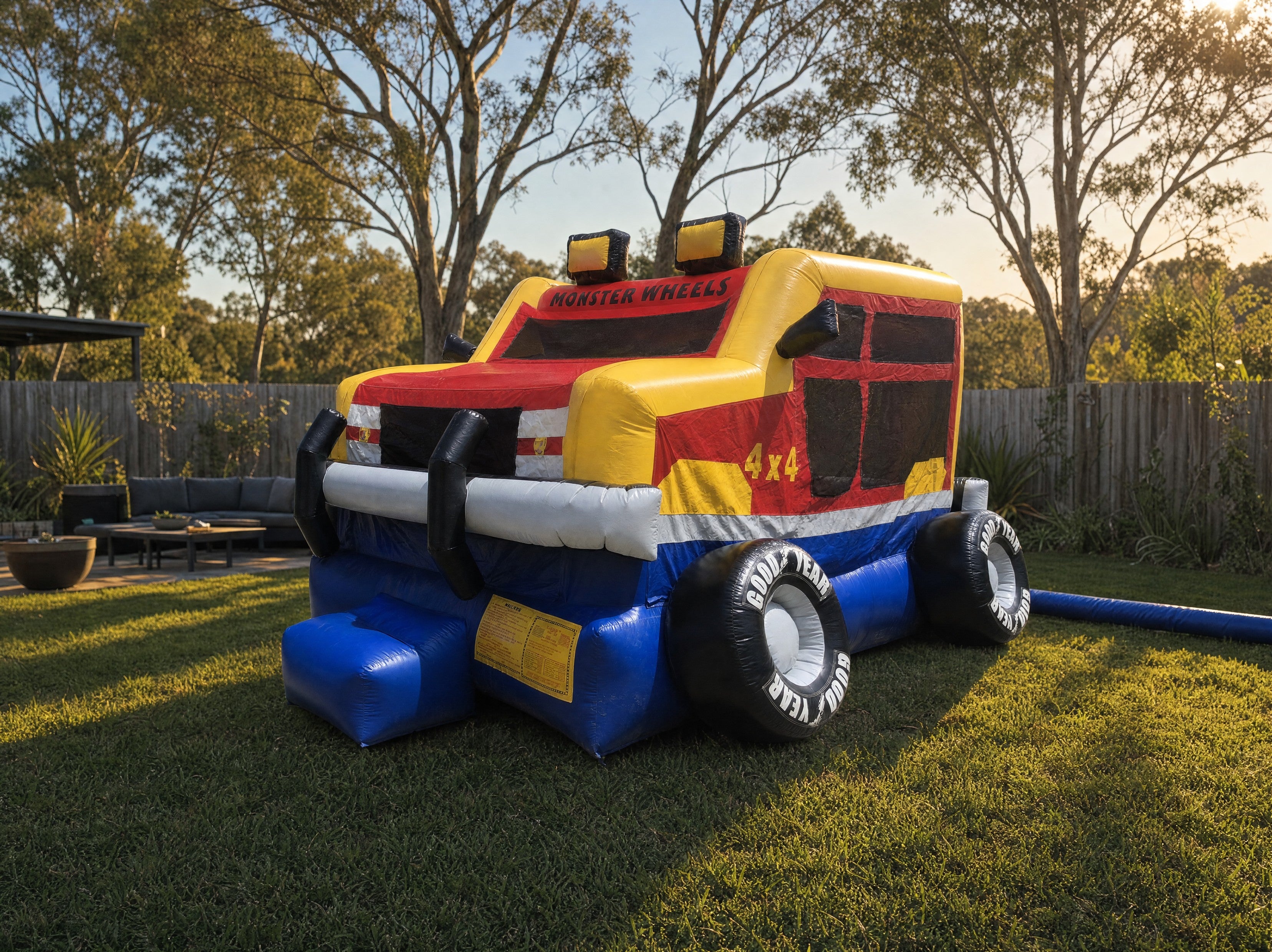 Monster Wheels Castle Combo hire set up in a spacious Central Coast backyard