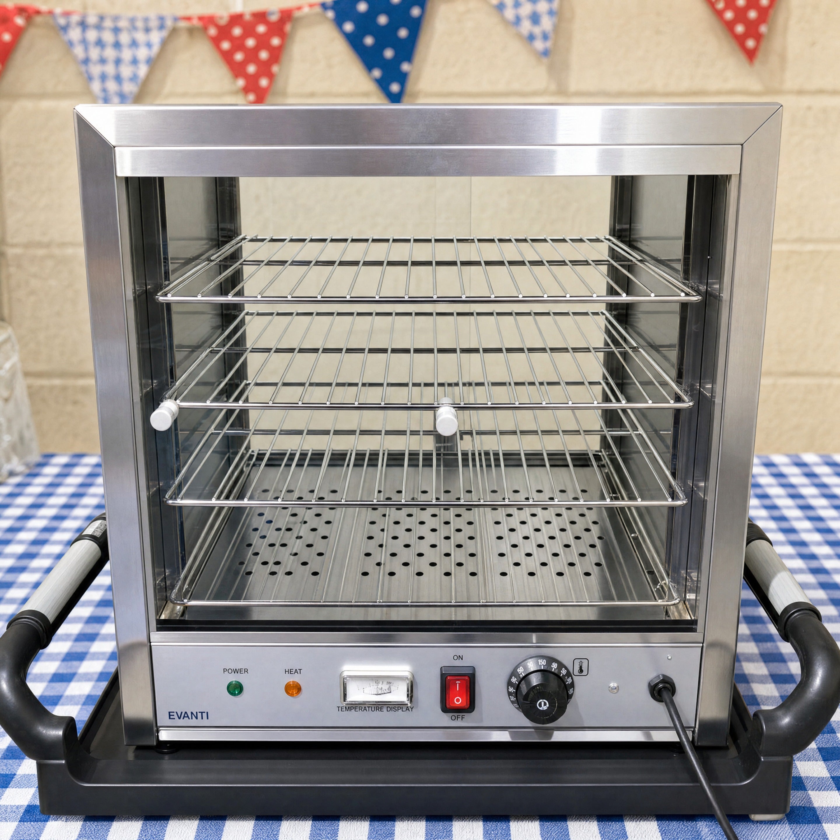 Pie warmer hire front view at a school fete stall with bunting