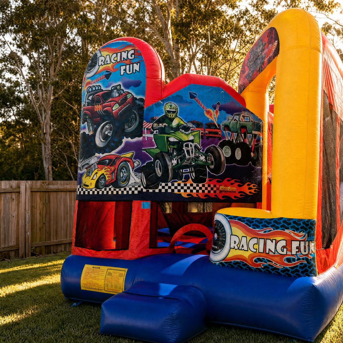 Racing Fun 5in1 Combo jumping castle in a Central Coast backyard at golden hour