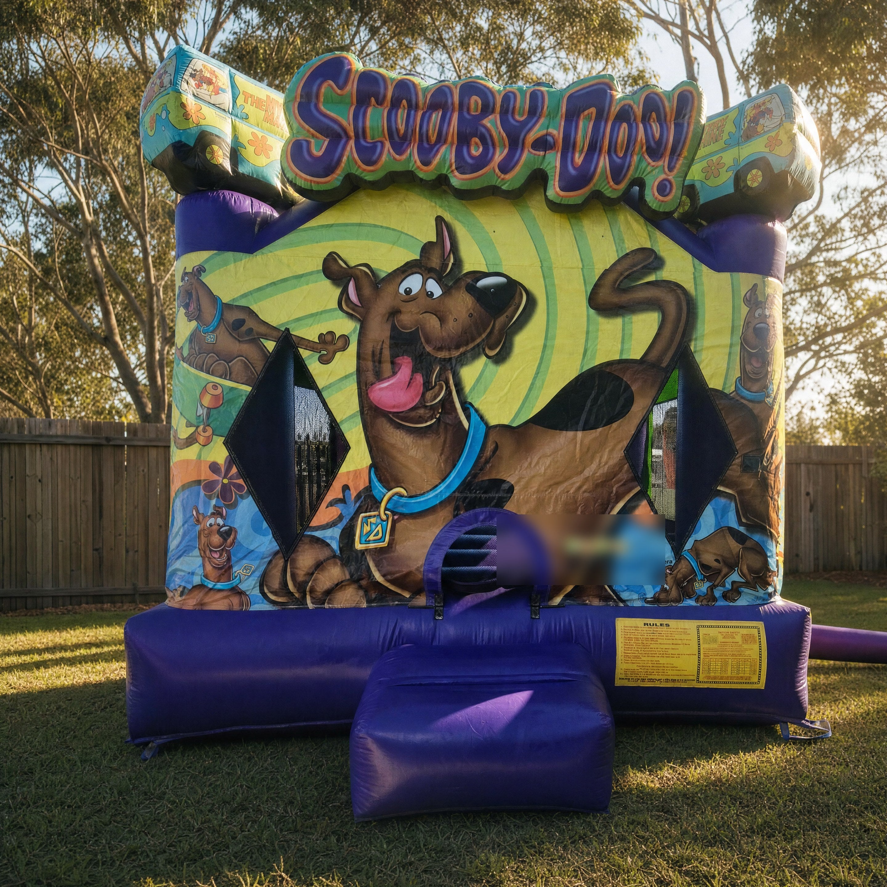 Scooby Doo Jumping Castle hire, front three-quarter view in a Central Coast backyard