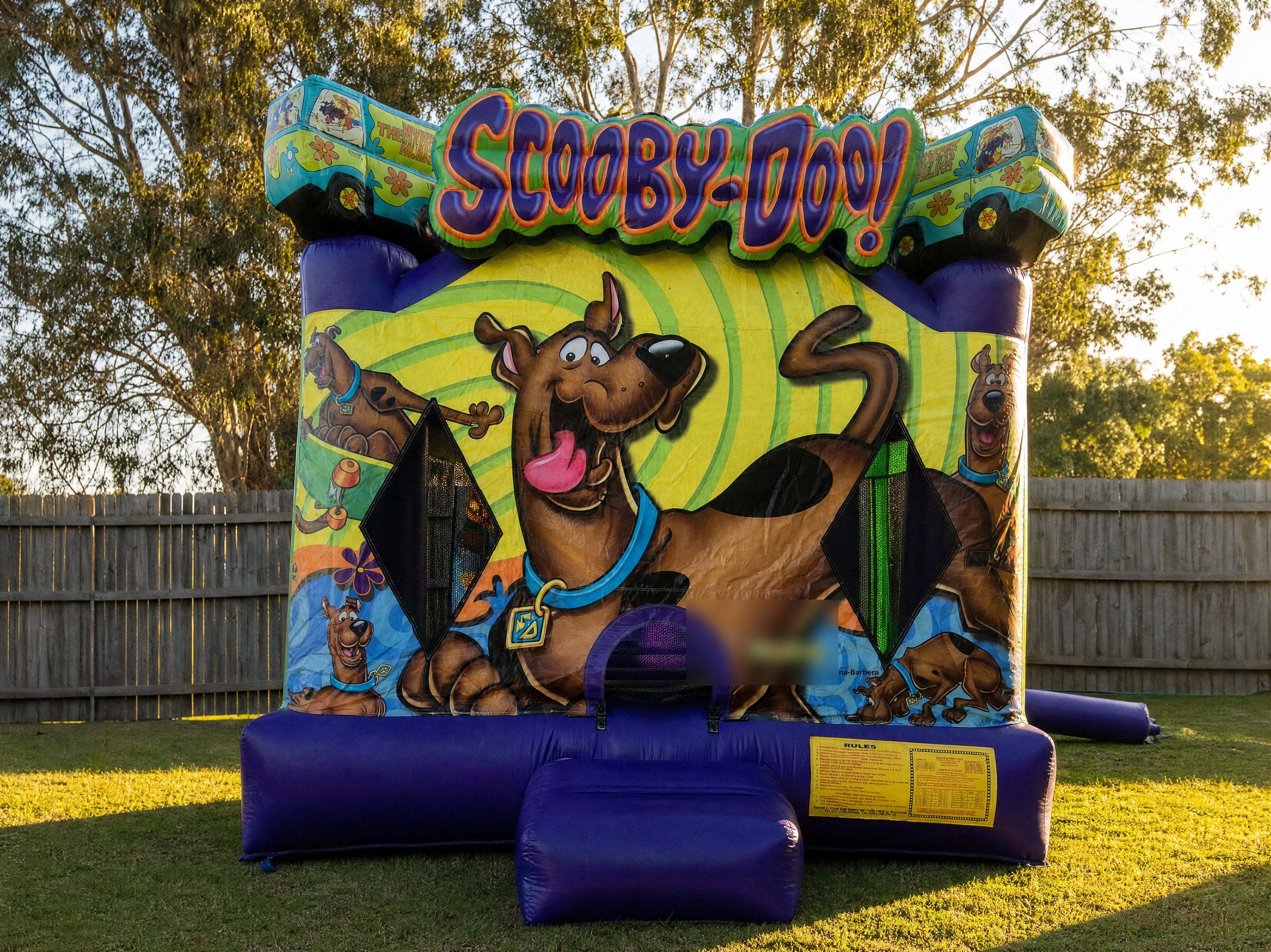 Scooby Doo Jumping Castle hire, front three-quarter view in a Central Coast backyard