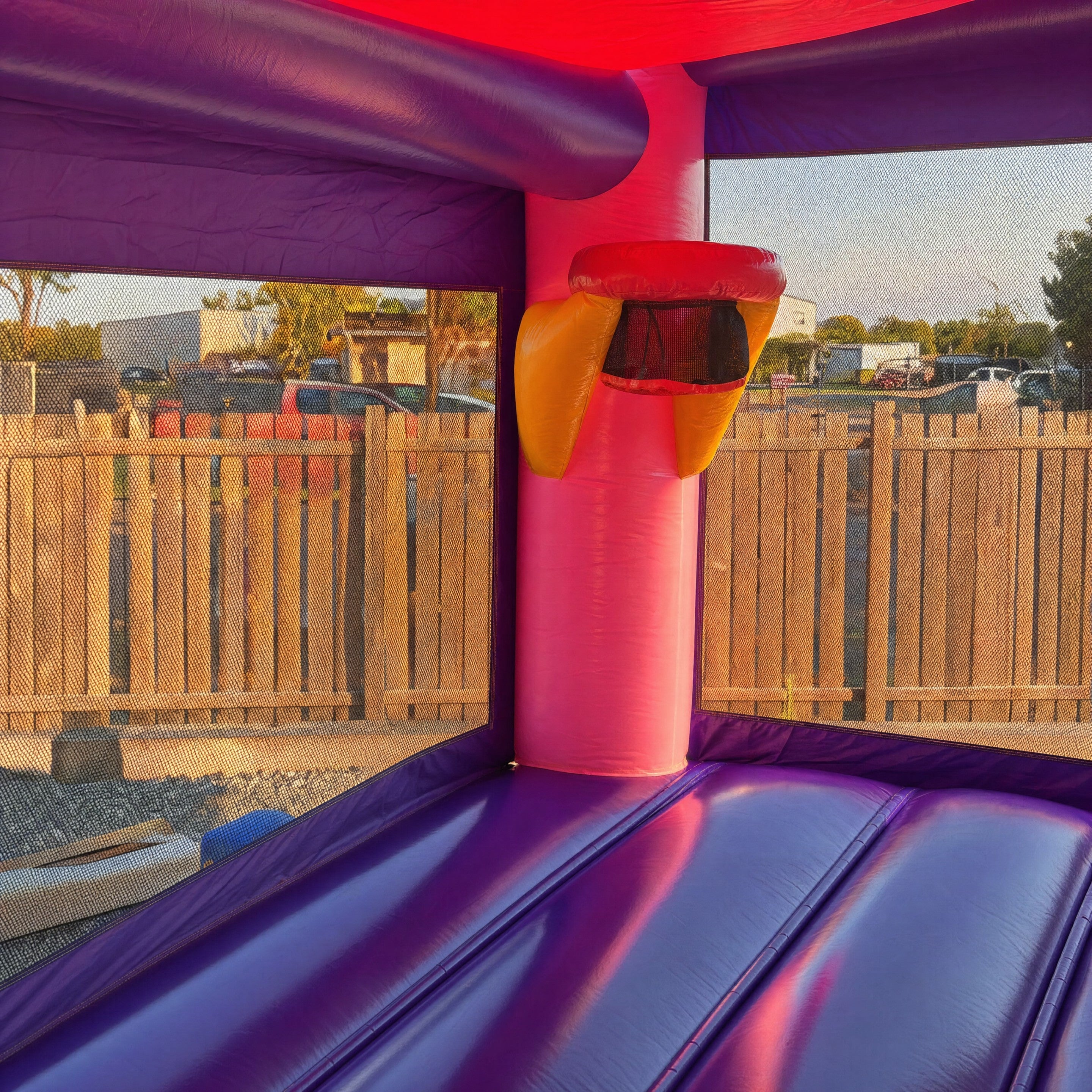 Basketball hoop activity inside the Sofia C4 Combo jumping castle