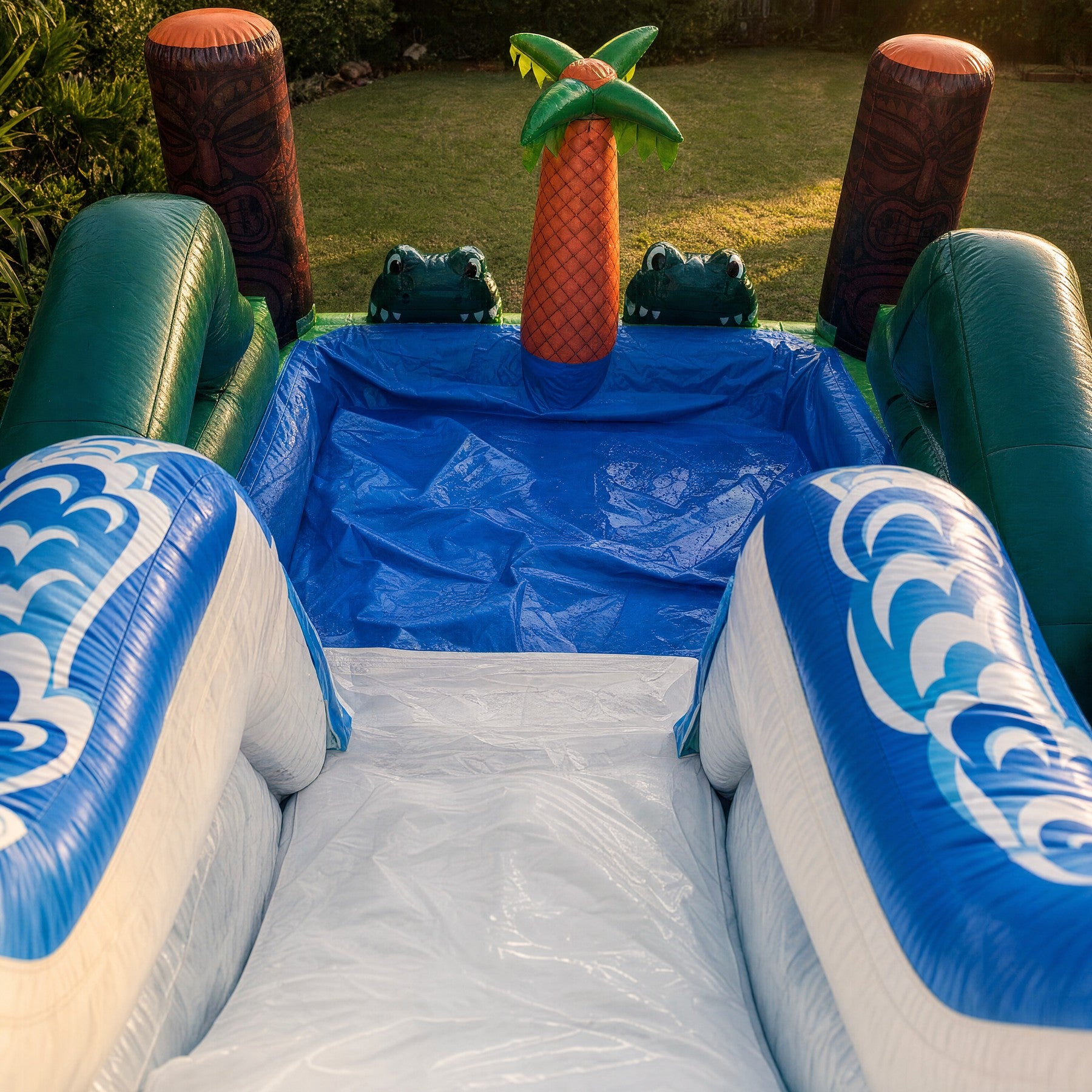 Tiki Falls Water Slide with Pool splash pool and palm tree centre post detail