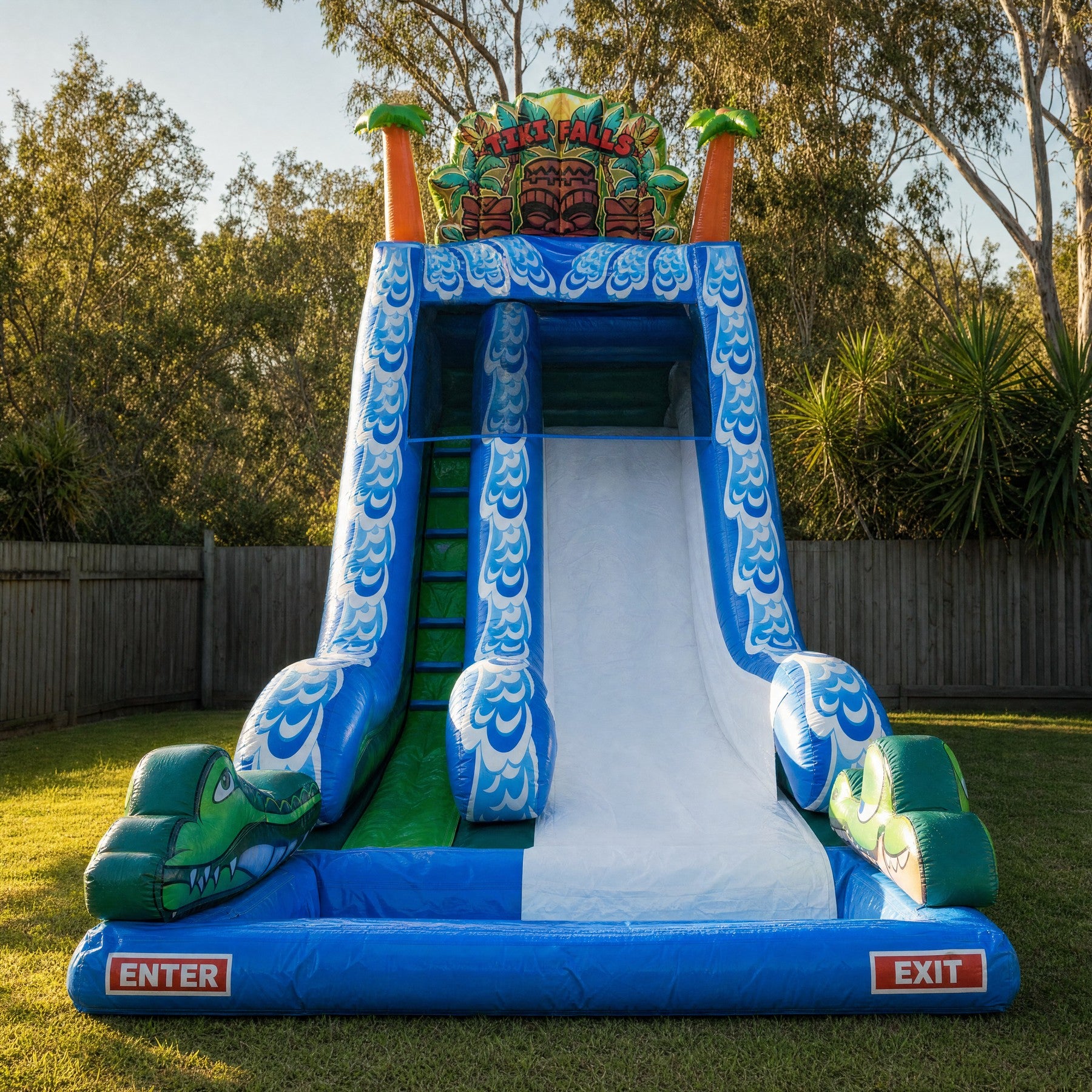 Tiki Falls Water Slide with Pool front view set up in a backyard on the Central Coast