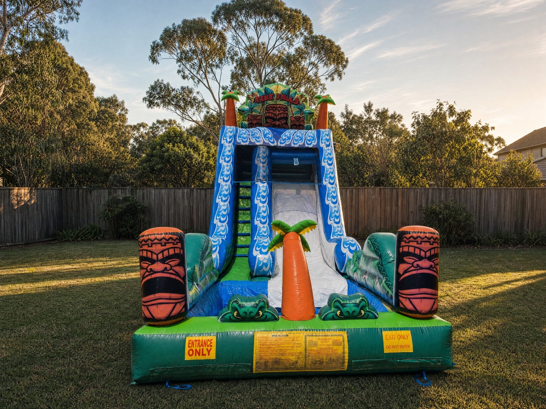 Tiki Falls Water Slide with Pool set up for a party in a Central Coast backyard