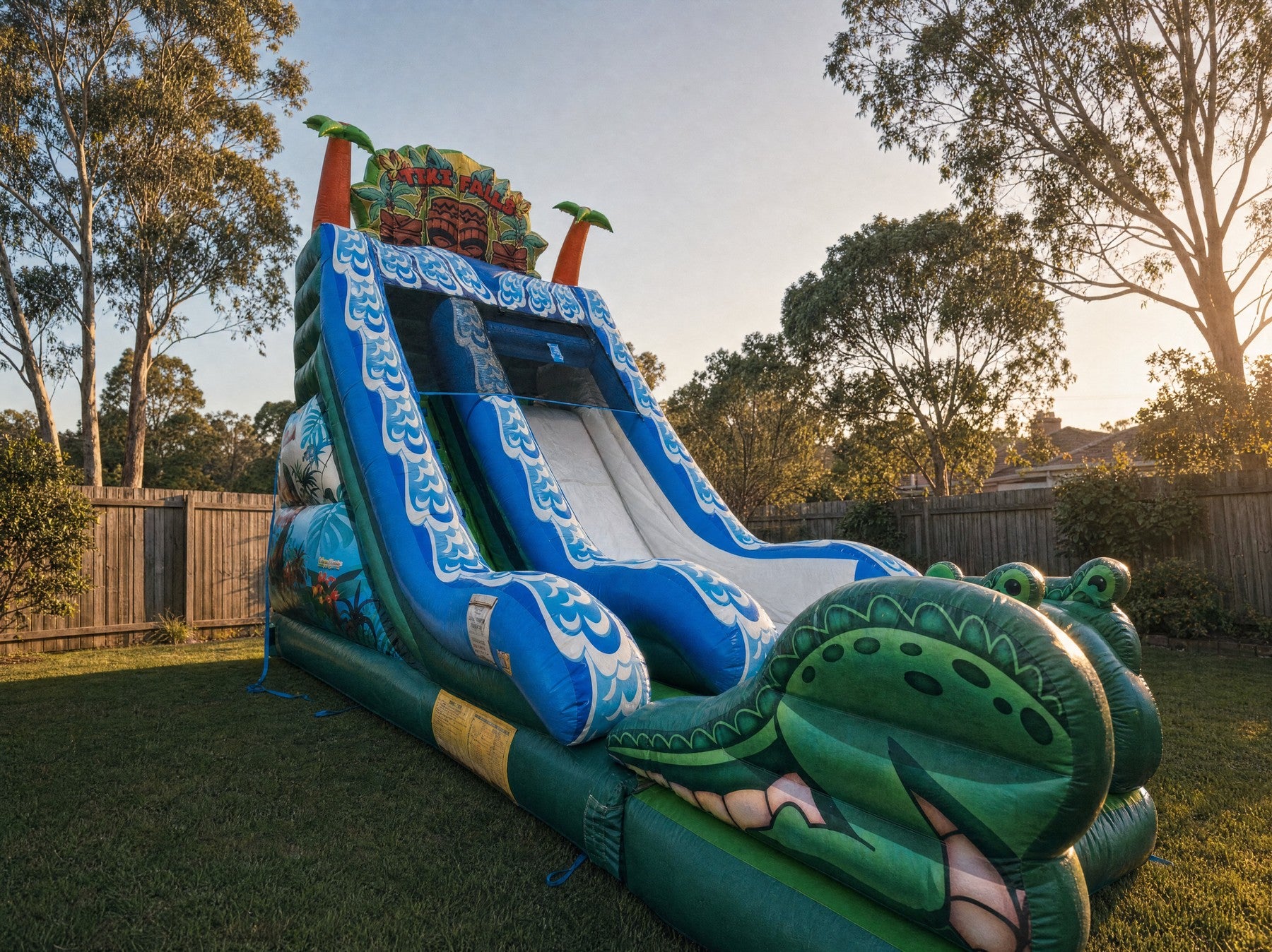 Tiki Falls Water Slide with Pool three-quarter angle showing the jungle mural side panel