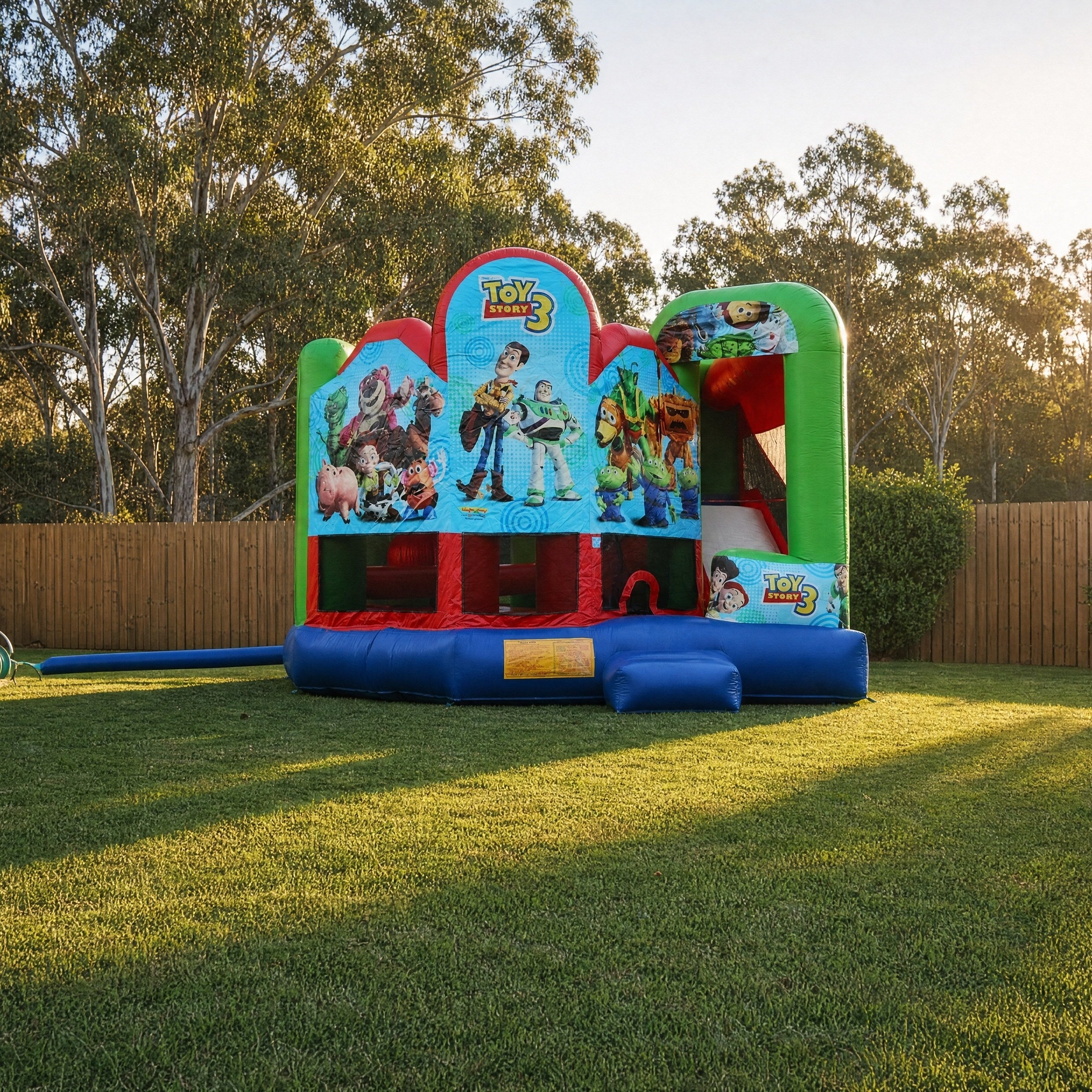 Toy Story 5in1 Combo Castle Hire, pulled-back scale shot showing yard size context