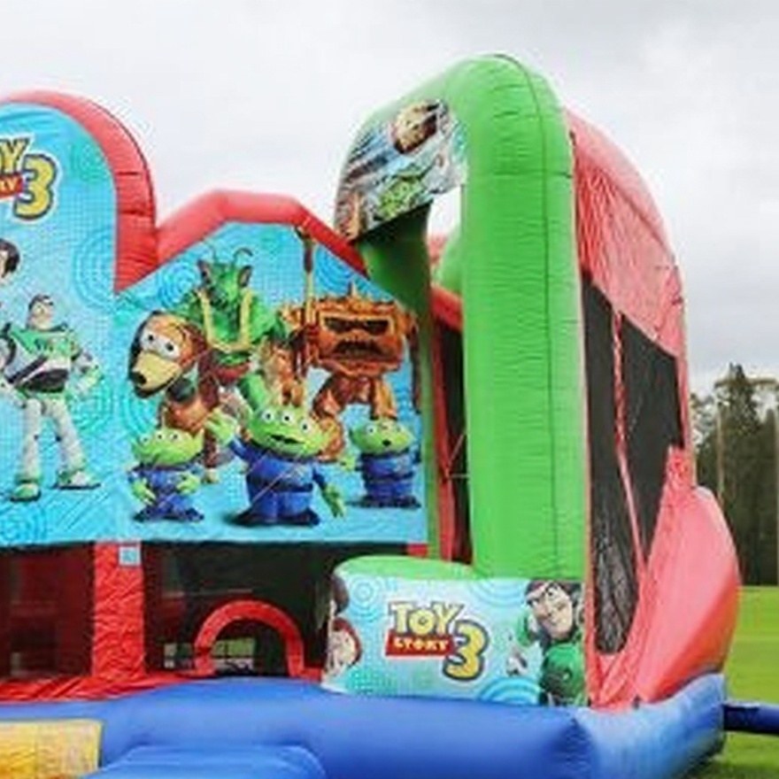 Toy Story 5in1 Combo Castle Hire, angled close crop showing the slide tower