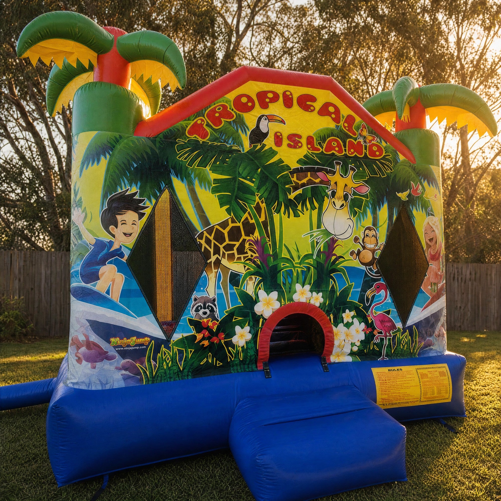 Tropical Island Jumping Castle set up in a Central Coast backyard, front three-quarter view