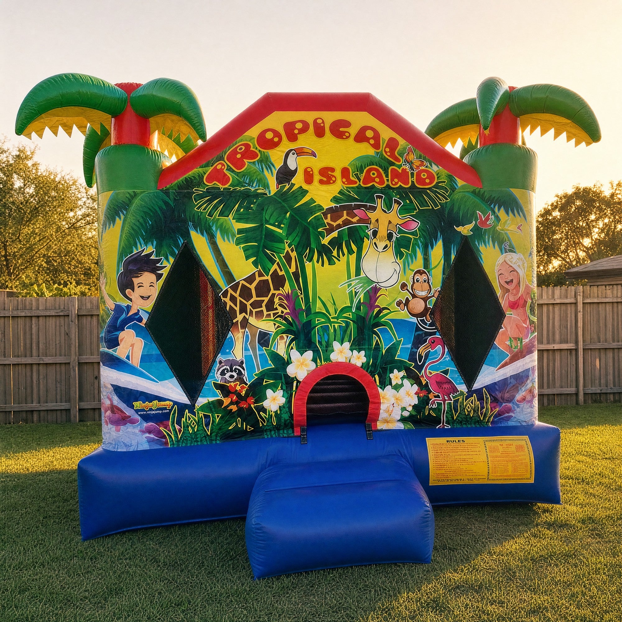 Tropical Island Jumping Castle front artwork panel showing toucan, giraffe and palm trees