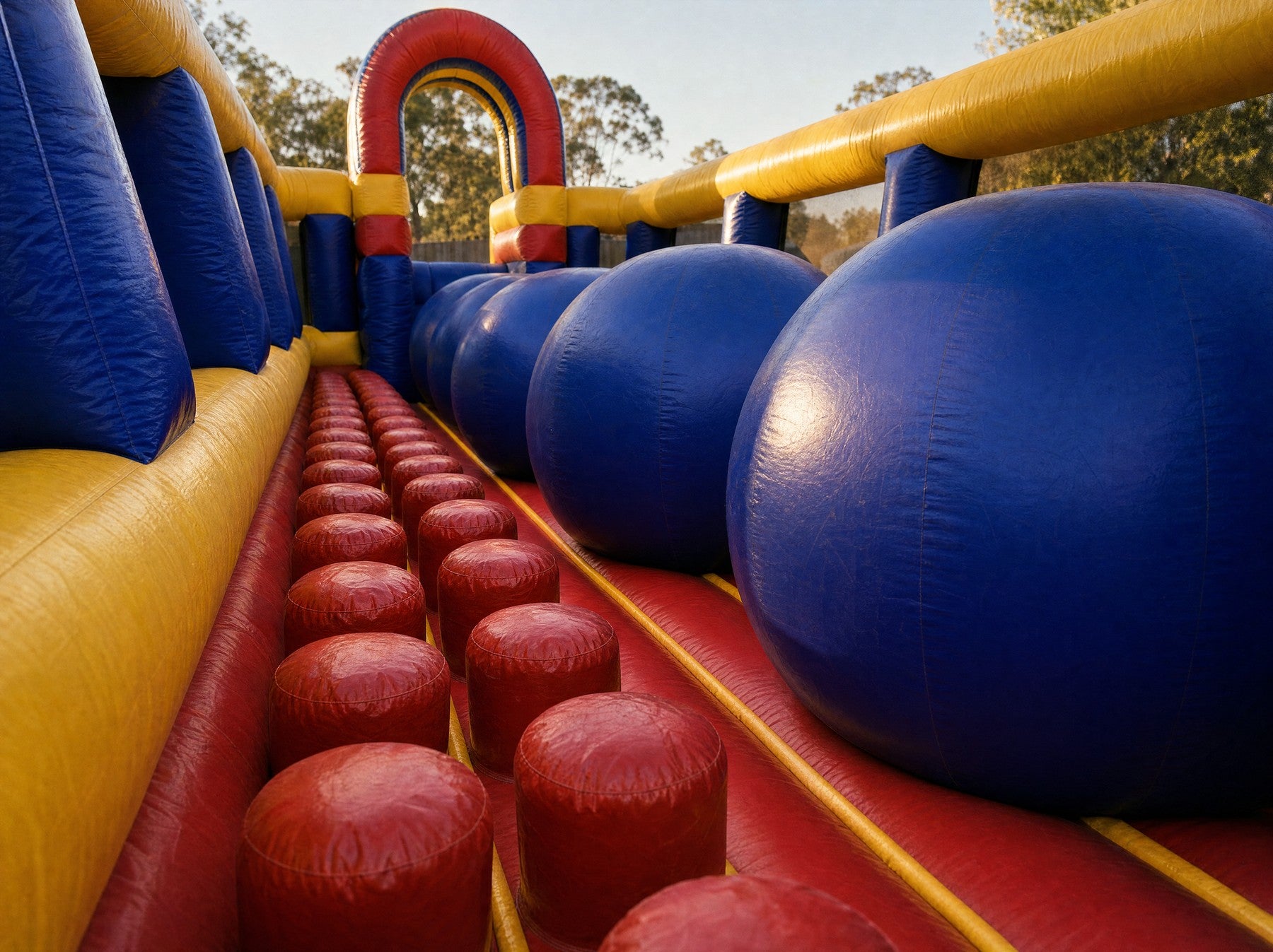 Interior lane view inside the Wipe Out Inflatable padded obstacle course
