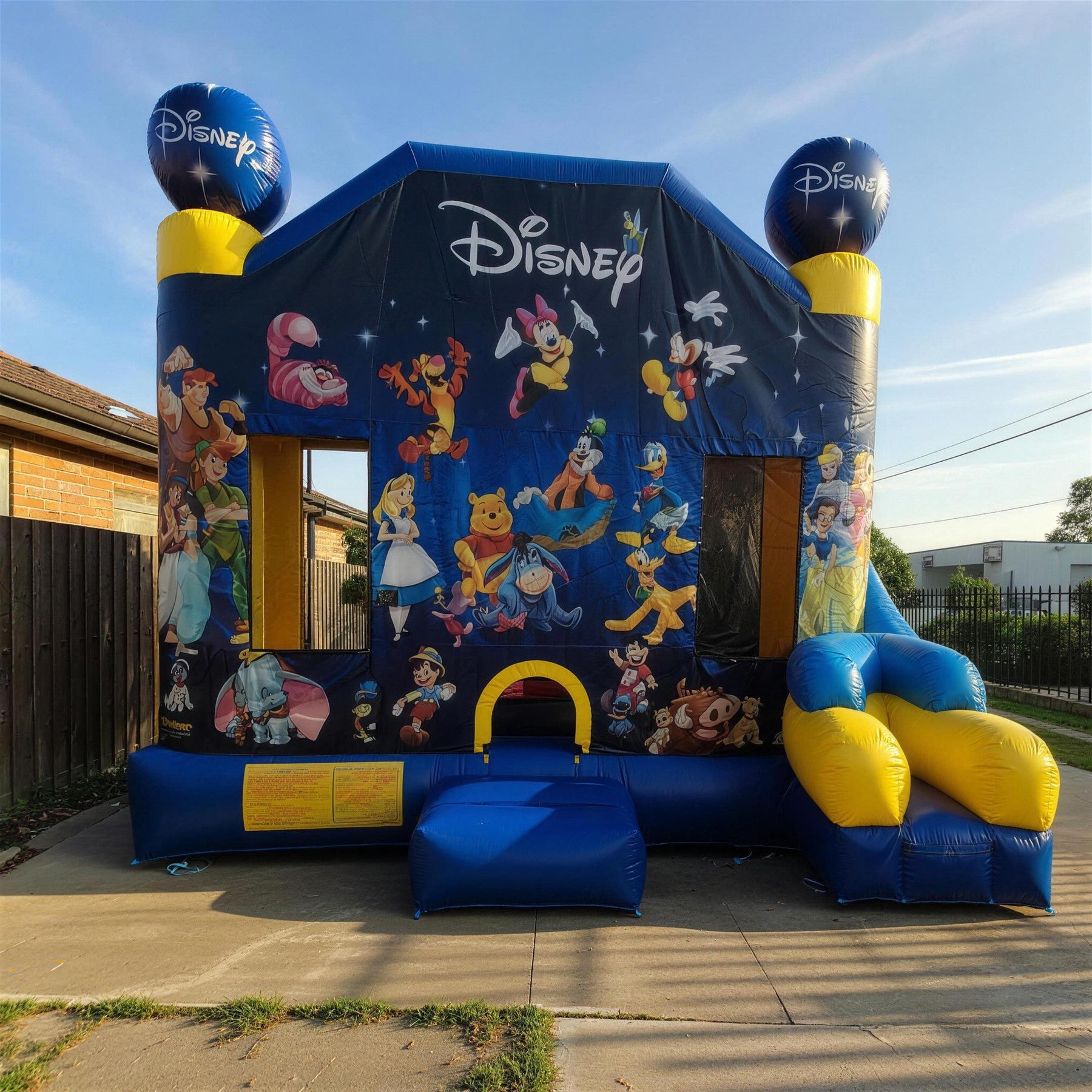 World of Disney C7 Combo jumping castle low angle view at sunset on the Central Coast