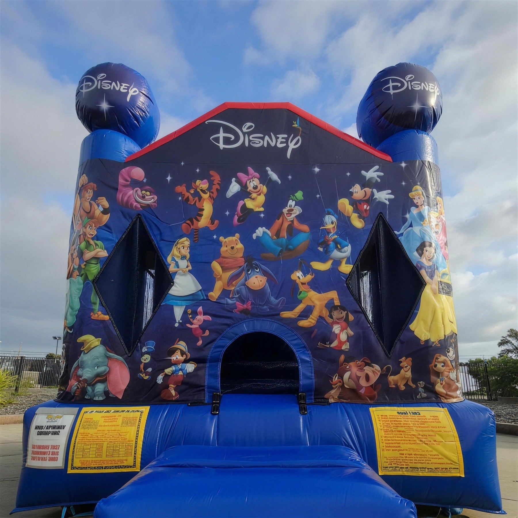 Low angle view looking up at the World of Disney jumping castle toppers