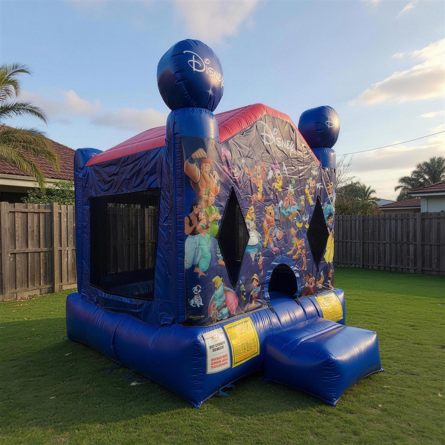 Side profile of the World of Disney jumping castle showing Hercules and Dumbo artwork